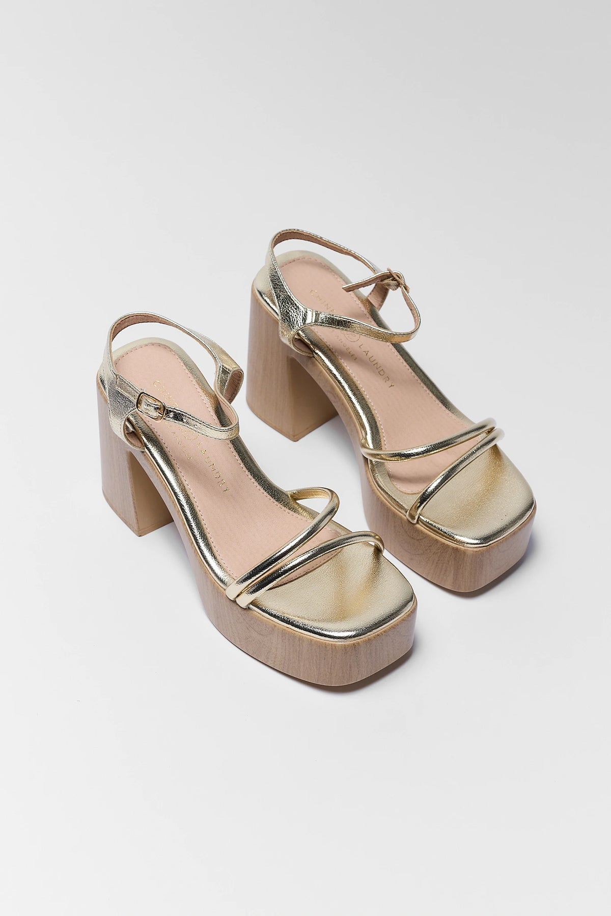 Gold Strappy Platform Heels with wood-tone block heel, pair overhead view | Avara