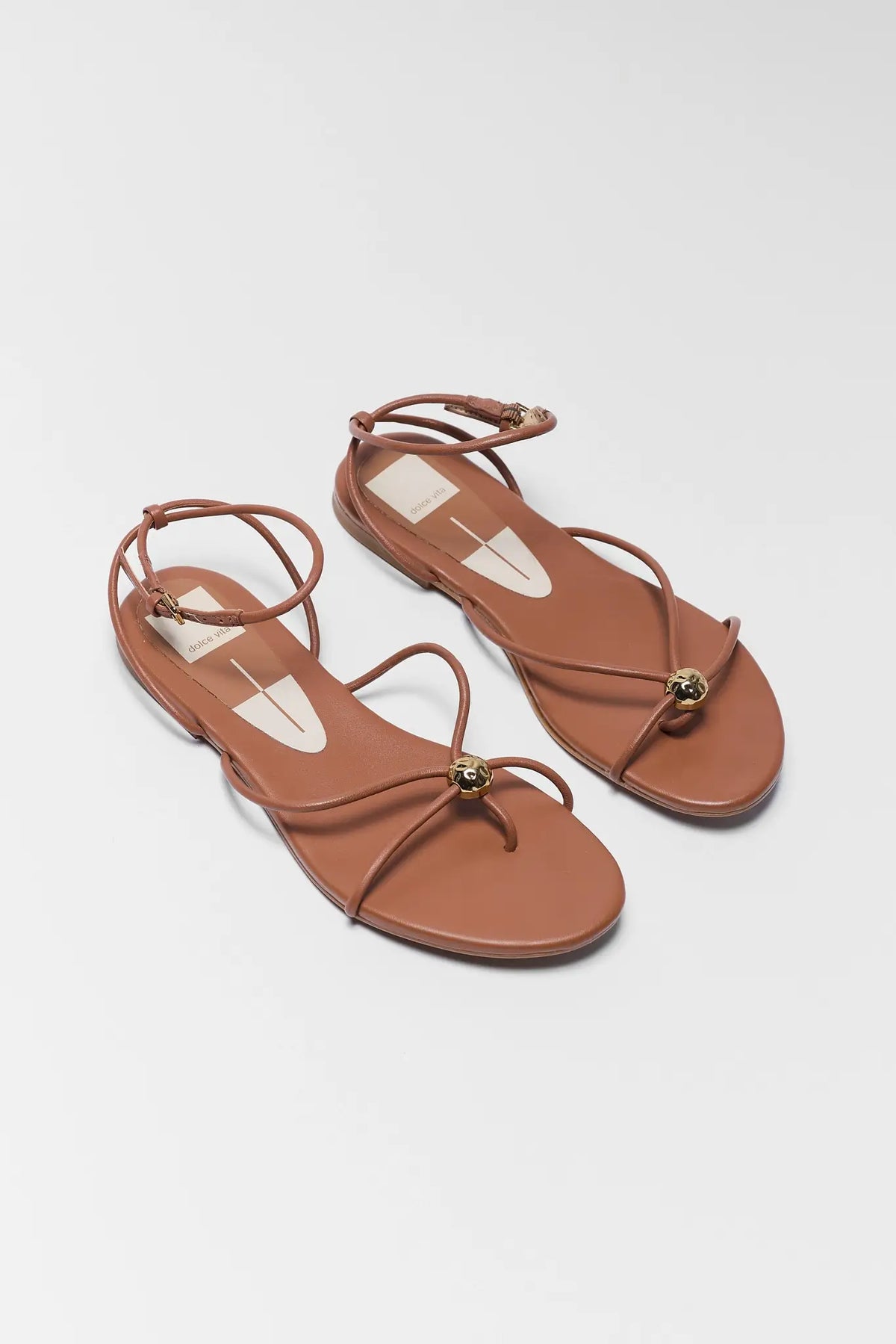 Dolce Vita Kenley light brown leather thin strap sandals with gold ball detail - Pair Top View | Avara