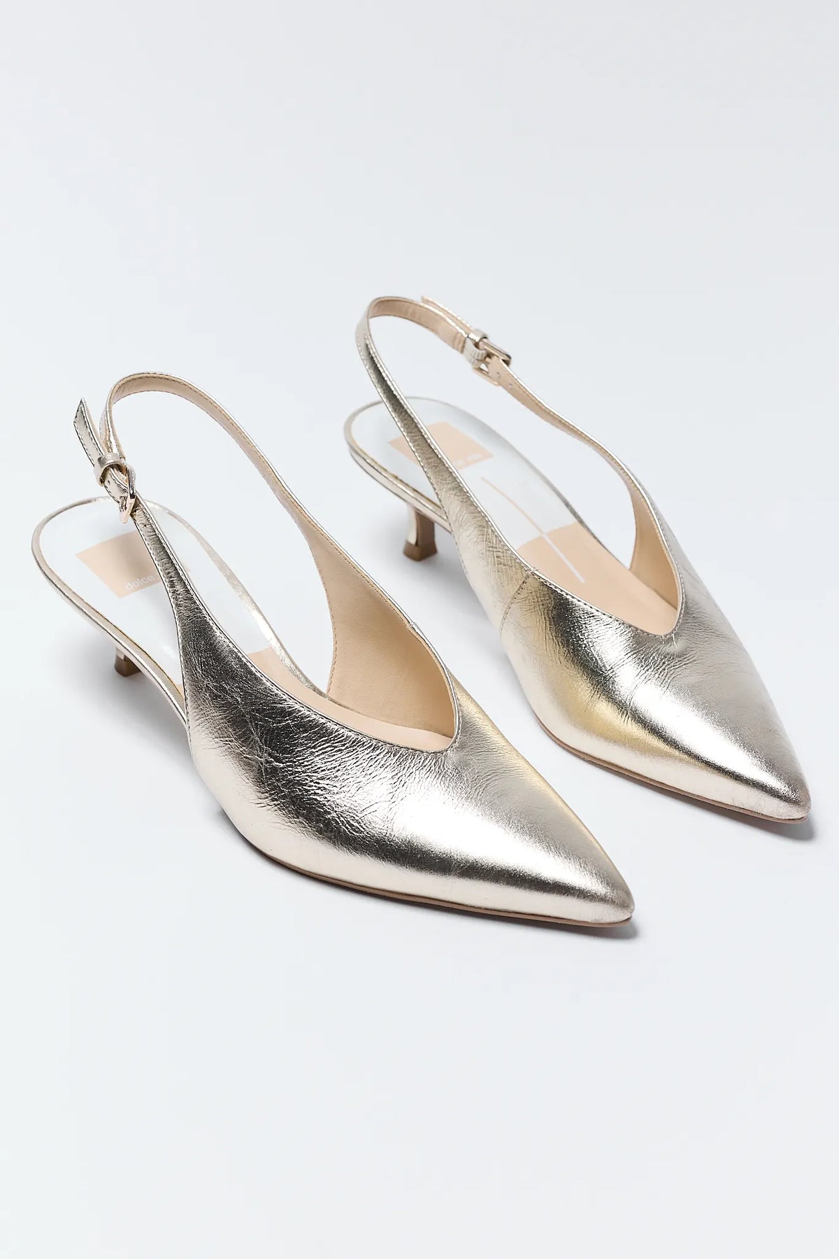 Pair of Alenna Gold Pointed Toe Kitten Heel Slingbacks - Front Angle | Avara