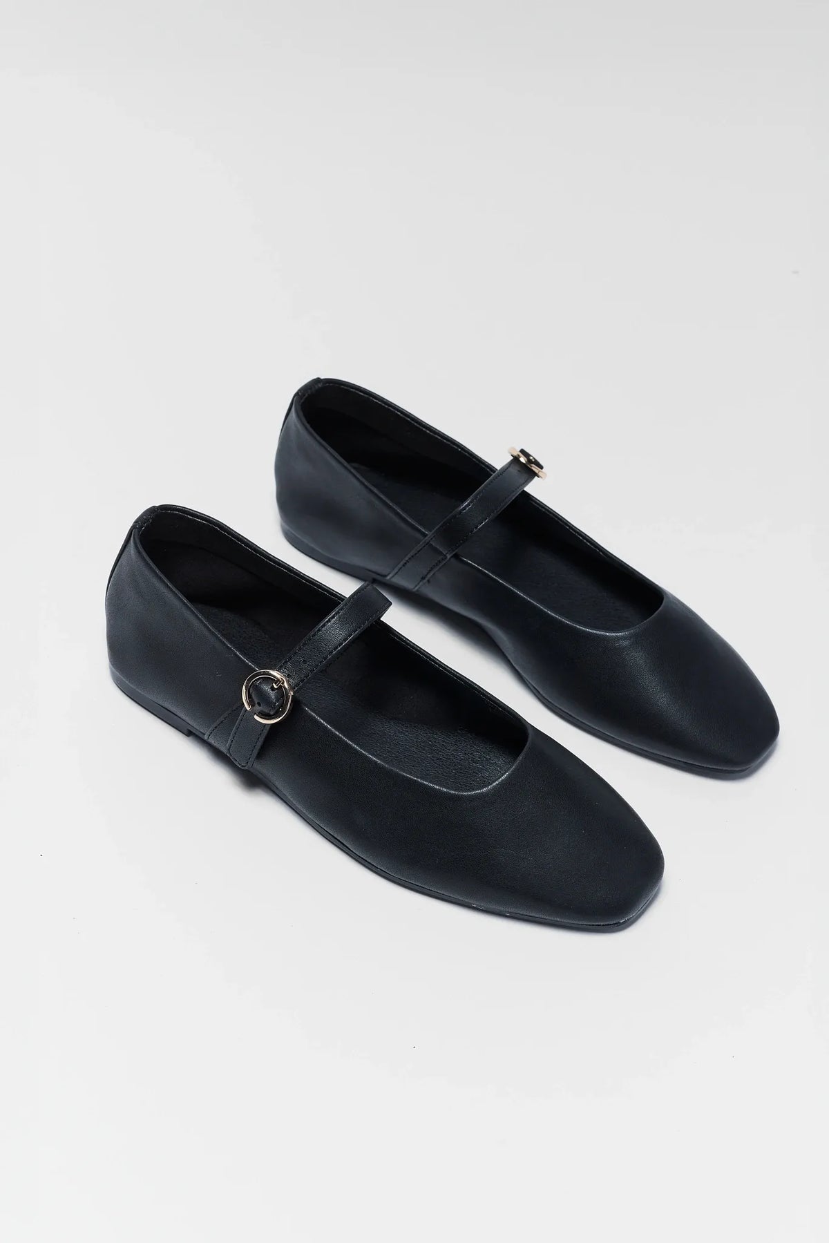 Black Faux Leather Women's Flats - Pair Angled View, Square Toe & Strap Buckle | Avara