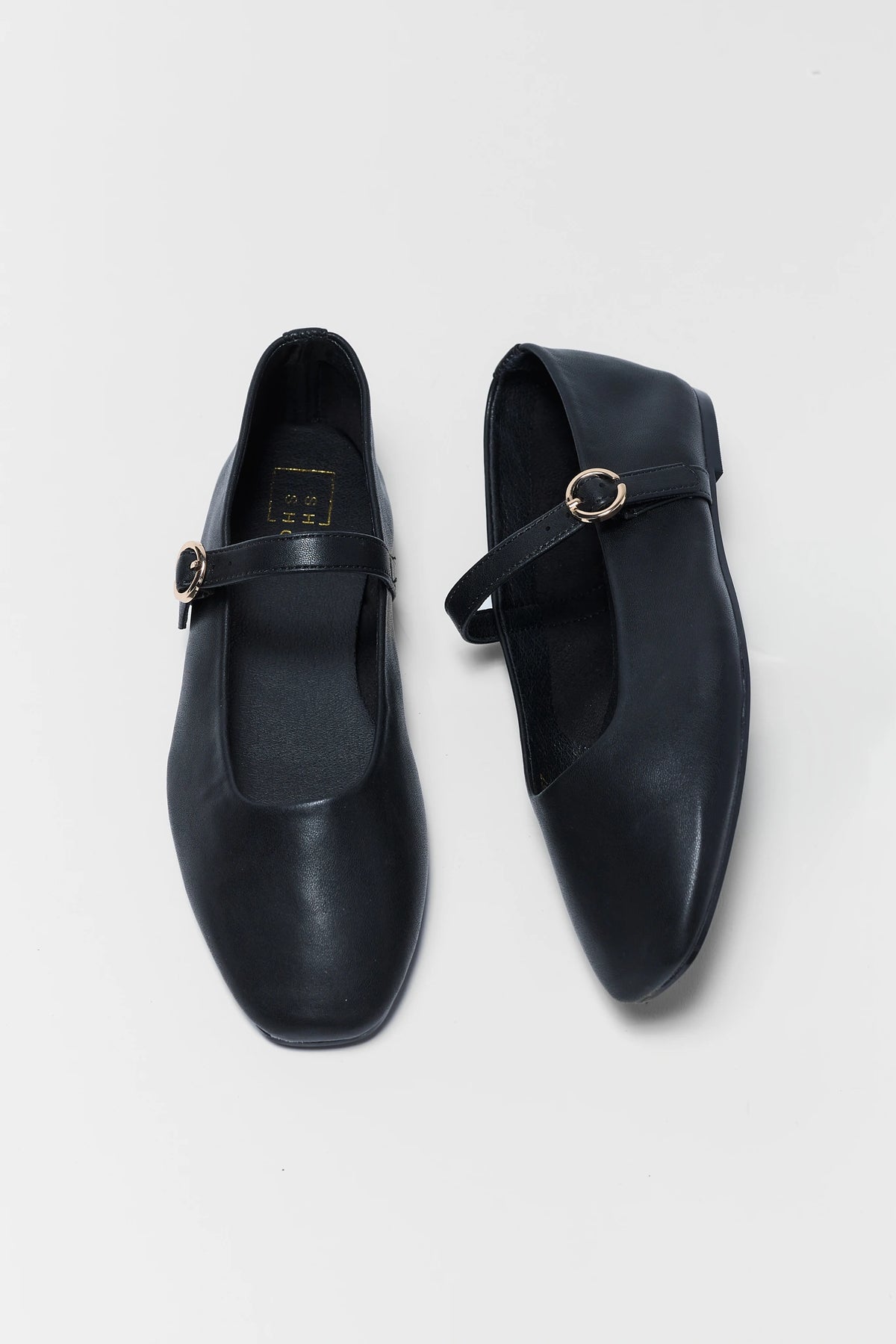 Black Faux Leather Mary Jane Flats - Top View, Square Toe & Gold Buckle Detail | Avara