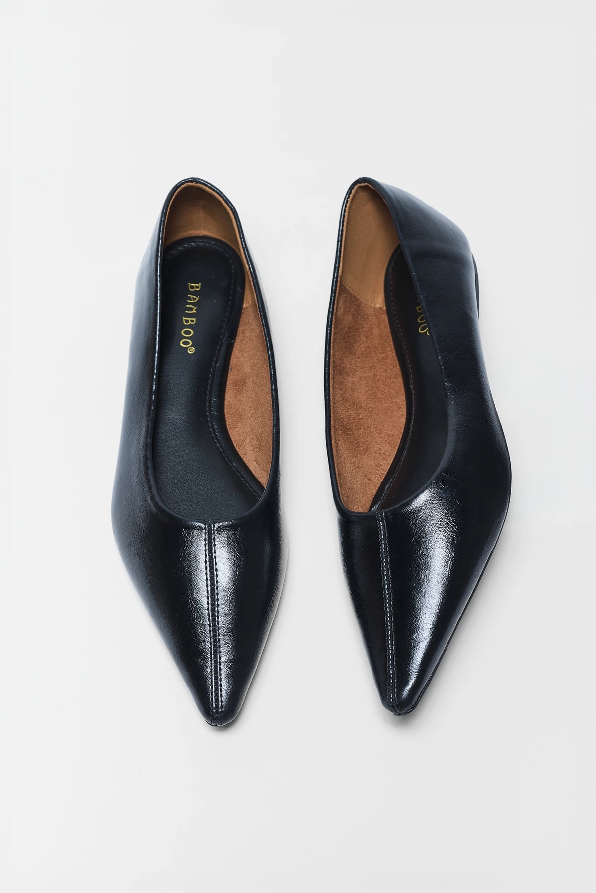 Black Faux Leather Pointed Toe Ballet Flats - Top View Pair, Tan Insole Visible | Avara