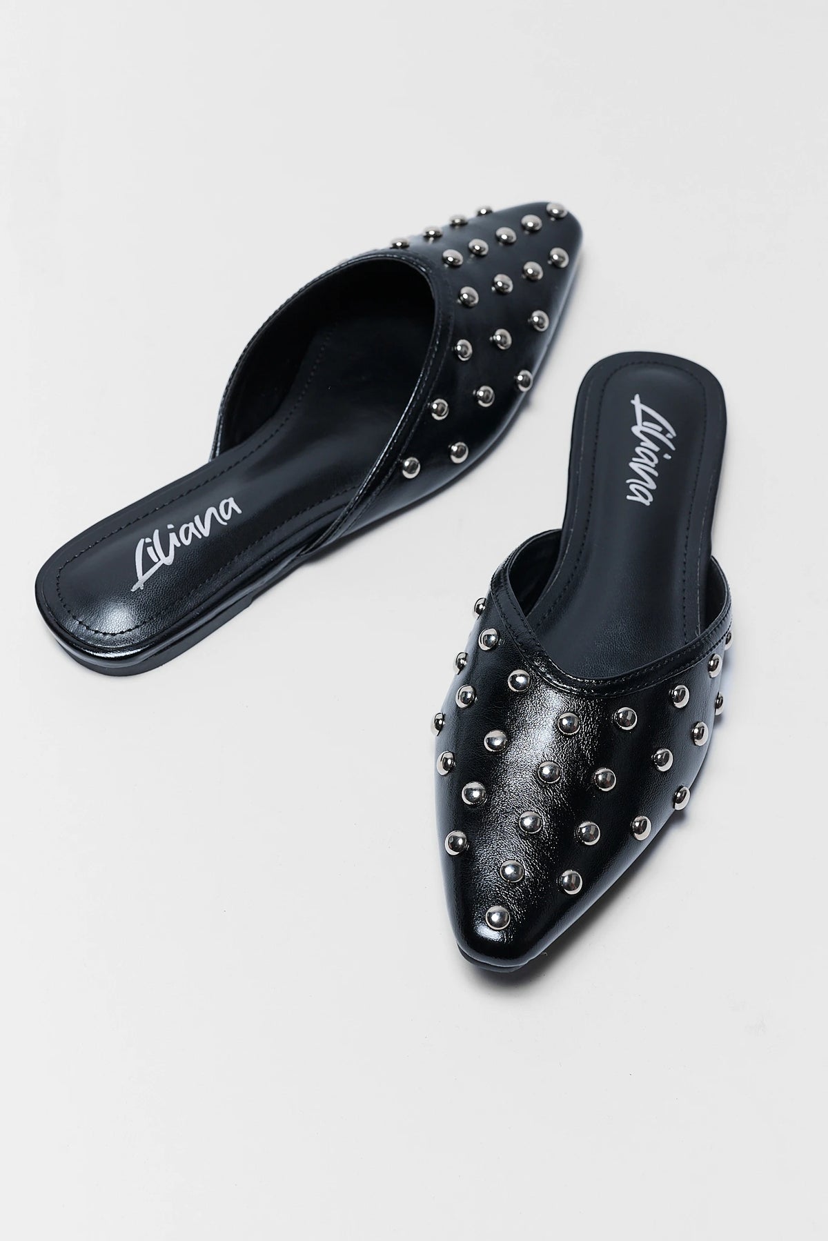 Black Studded Slip On Mule - Flat Lay Pair Overhead View, Silver Studs on Pointed Toe | Avara
