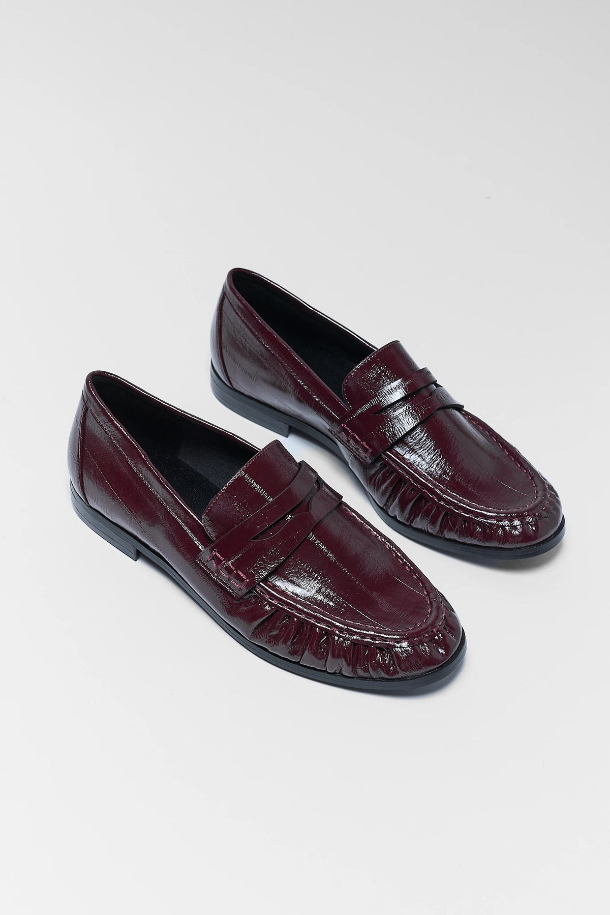 Maroon Faux Leather Penny Loafers - Angled Pair View | Avara