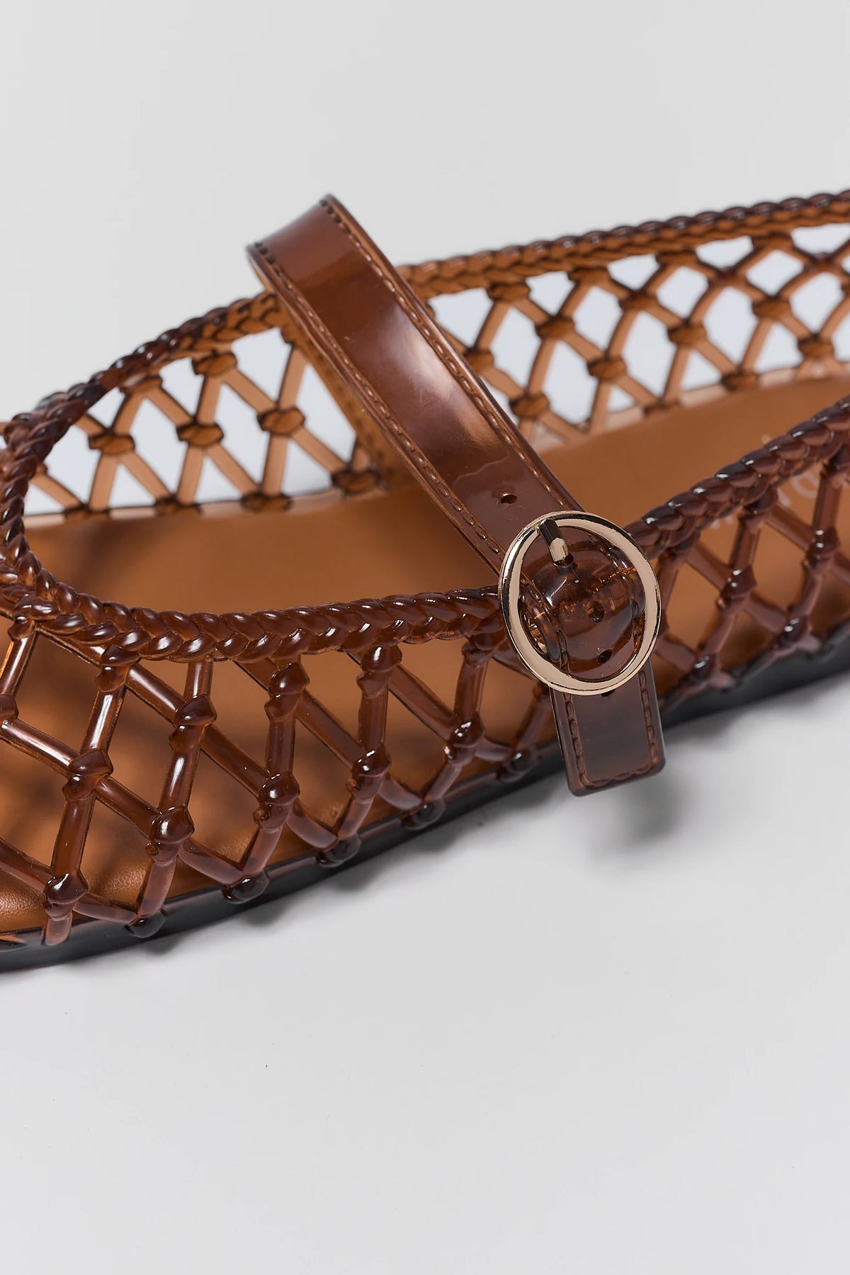 Brown Lattice Jelly Flats - Gold Buckle Strap Close-Up Detail | Avara