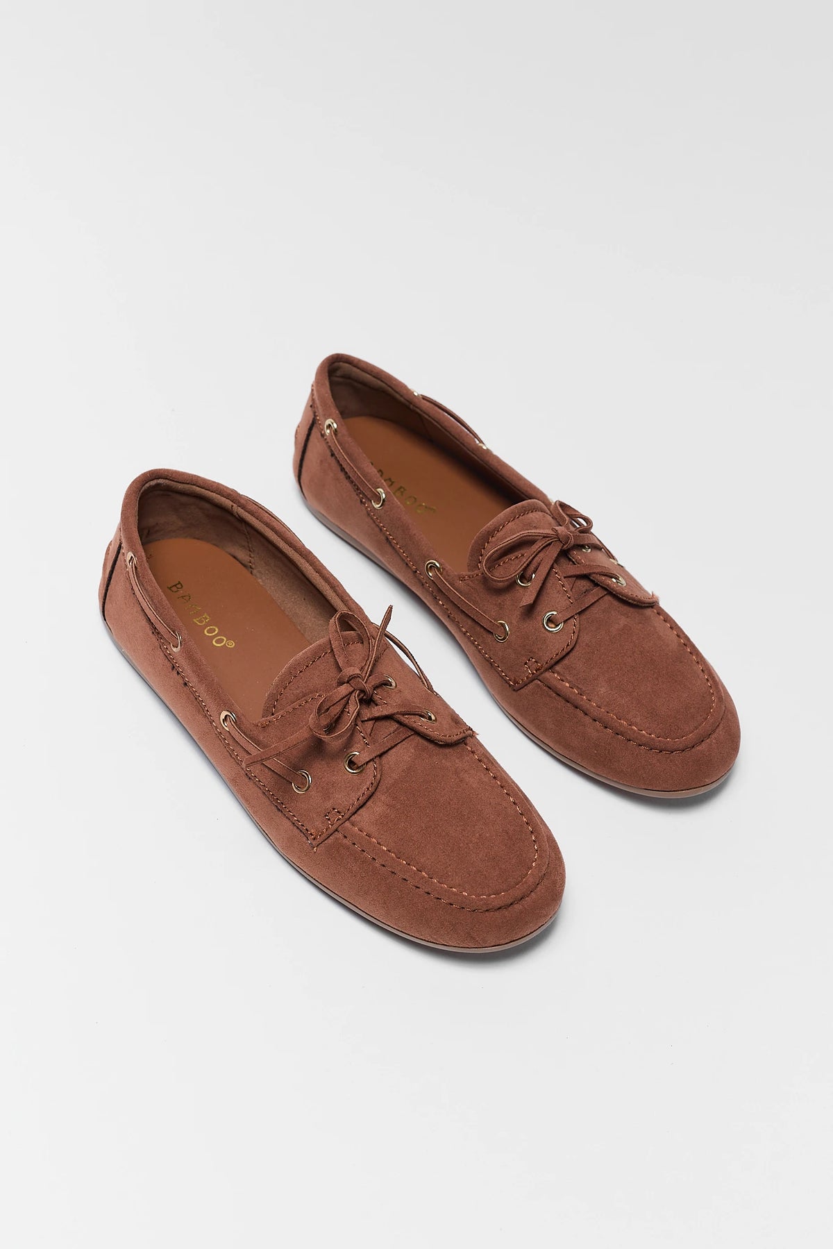 Pair of Camel Faux Suede Women's Boat Shoes - Angled Flat Lay | Avara