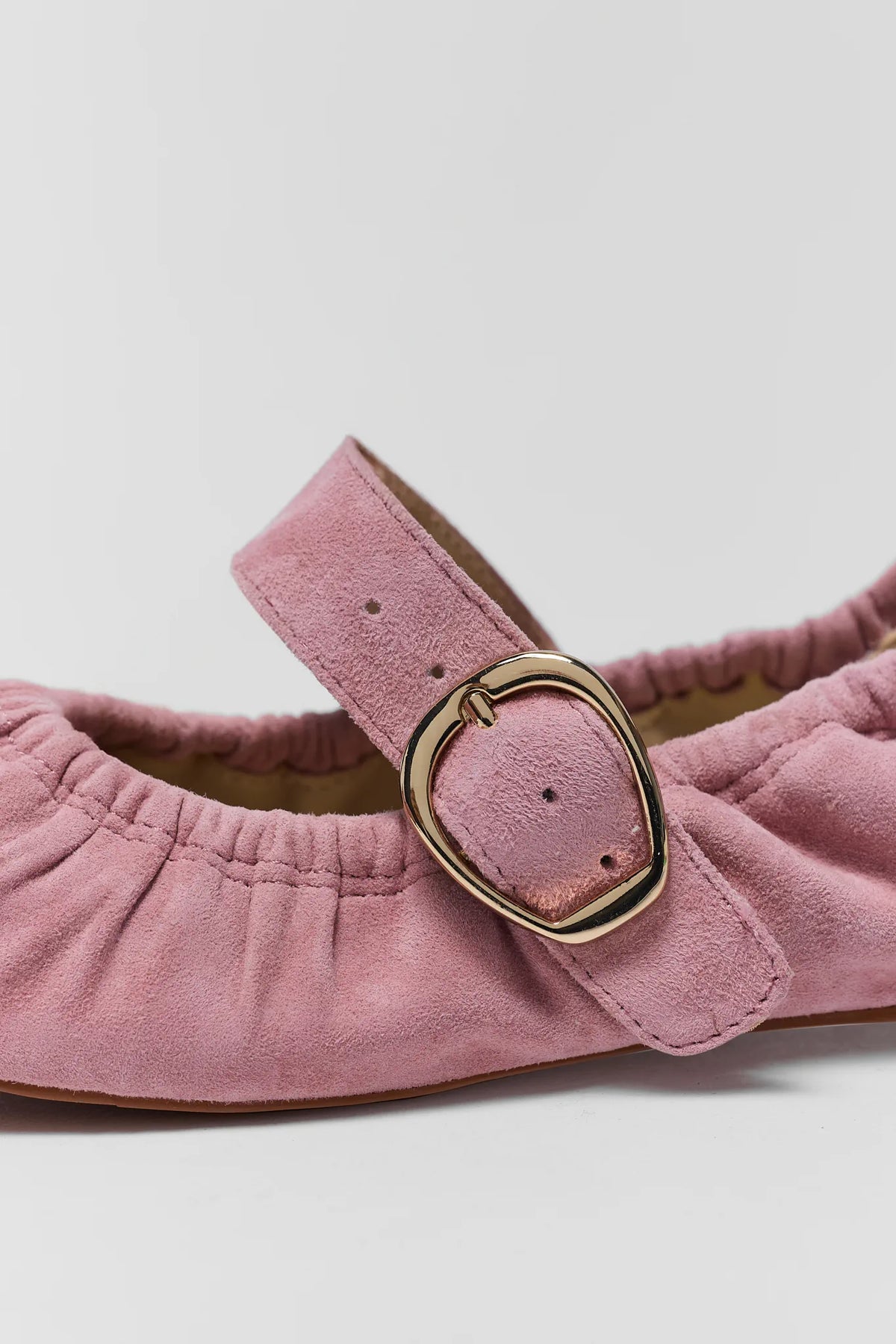 Pink suede ballet flat gold buckle strap and ruched toe detail - Close-Up | Avara