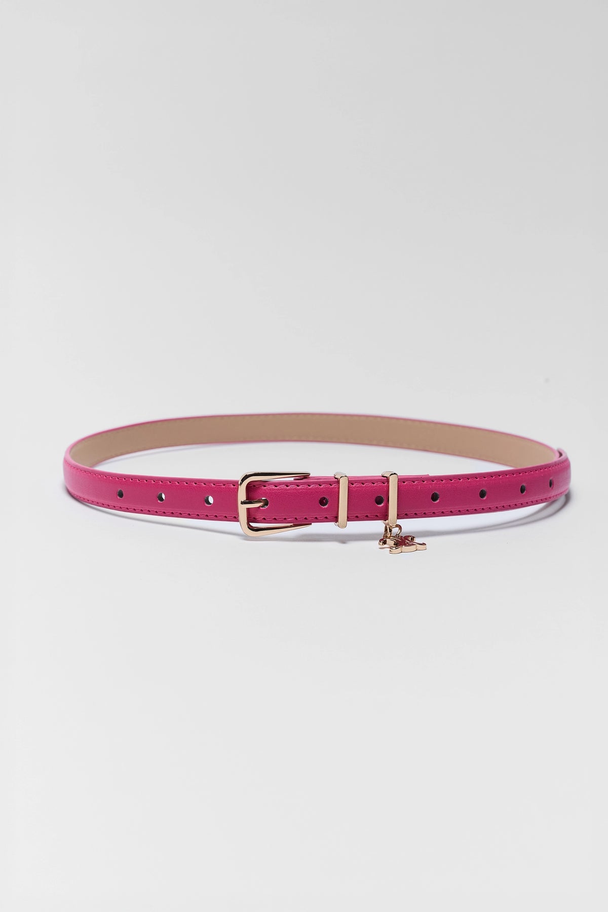 Chelsea Pink Faux Leather Belt with gold buckle and charm - Full Length Flat Lay | Avara