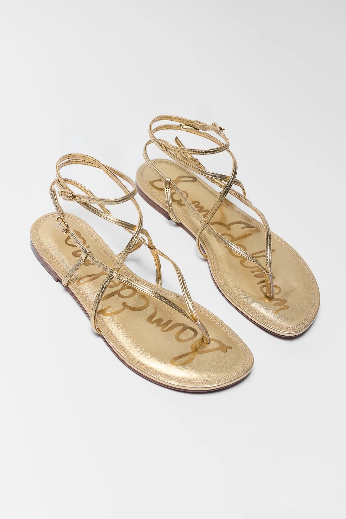 Sam Edelman Clarra Gold Strappy Sandals - Pair Front View Showing Toe Strap Design | Avara