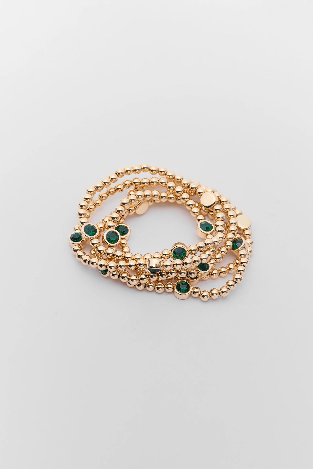Gold Beaded Green Rhinestone Bracelet Set stacked - Flat Lay | Avara