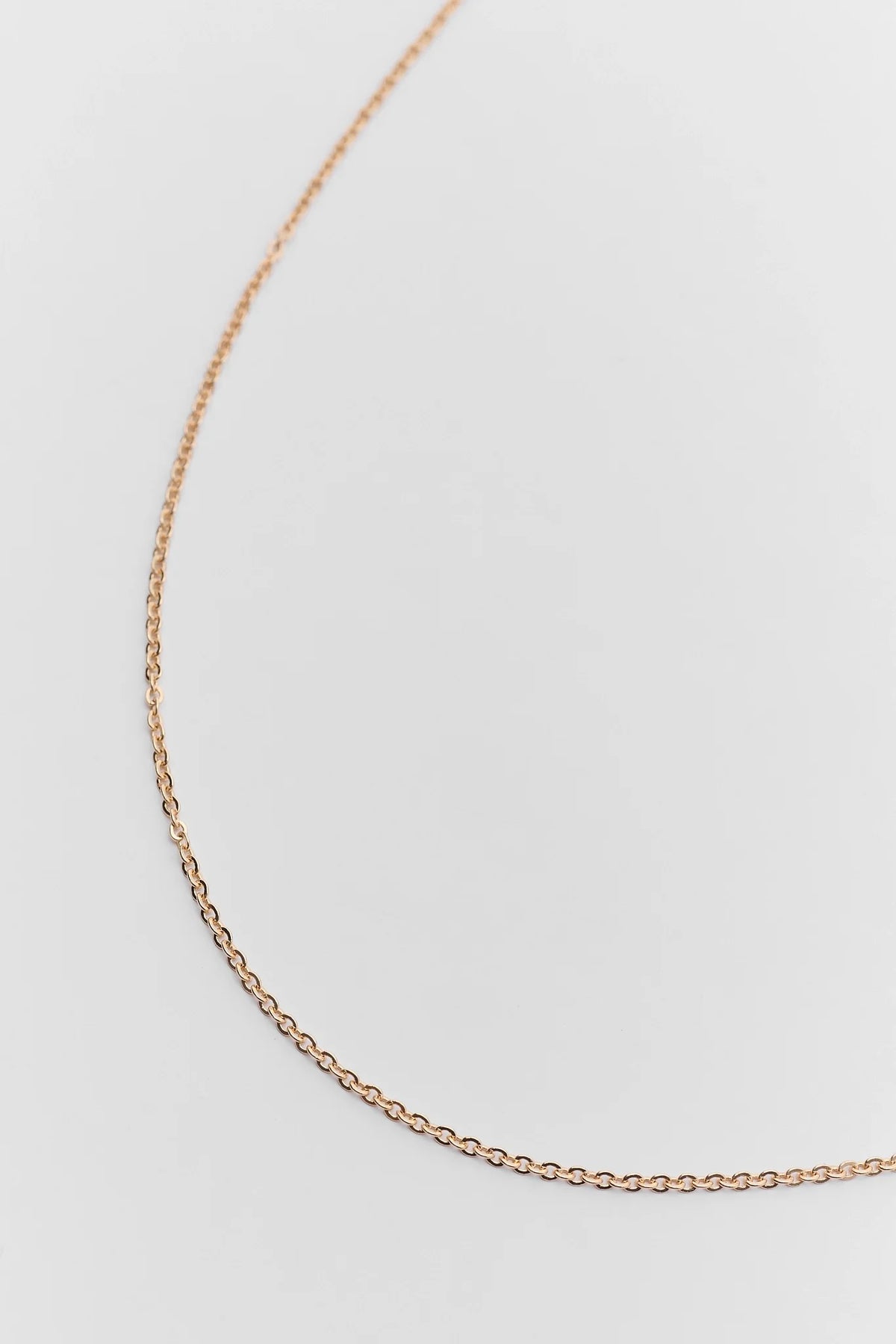 Dainty gold cable chain necklace close-up showing linked detail - Chain Detail | Avara