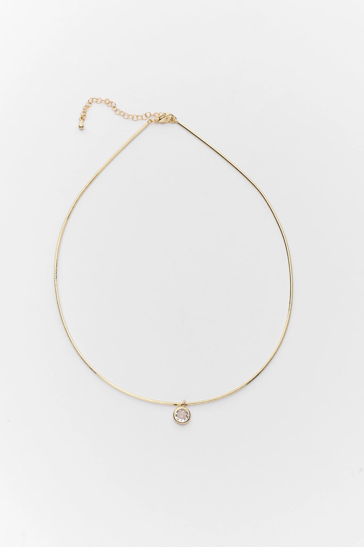 Gold Rhinestone Charm Necklace - Flat Lay, Herringbone Chain with Crystal Pendant | Avara