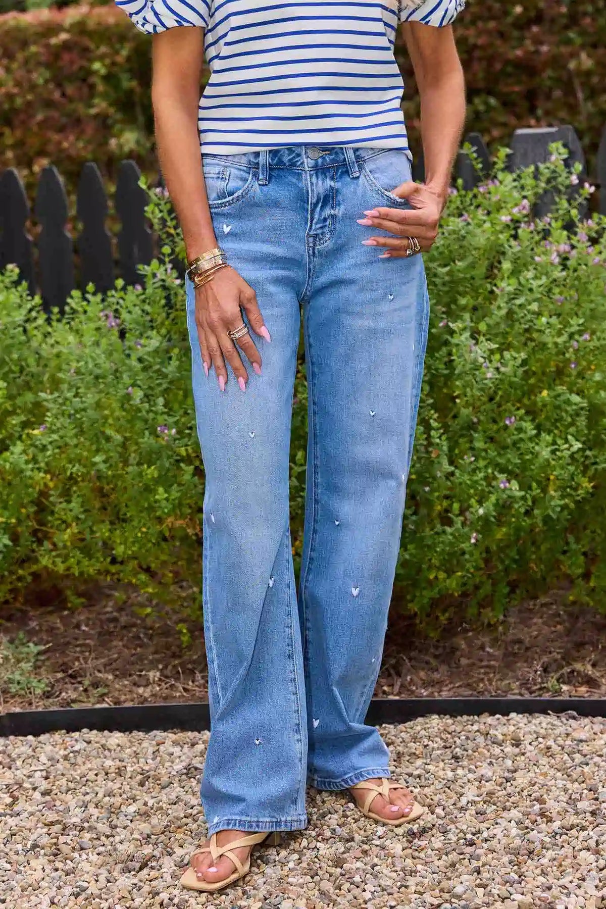 Hadley Medium Wash Embroidered Jeans styled with striped top outdoors - Lifestyle | Avara