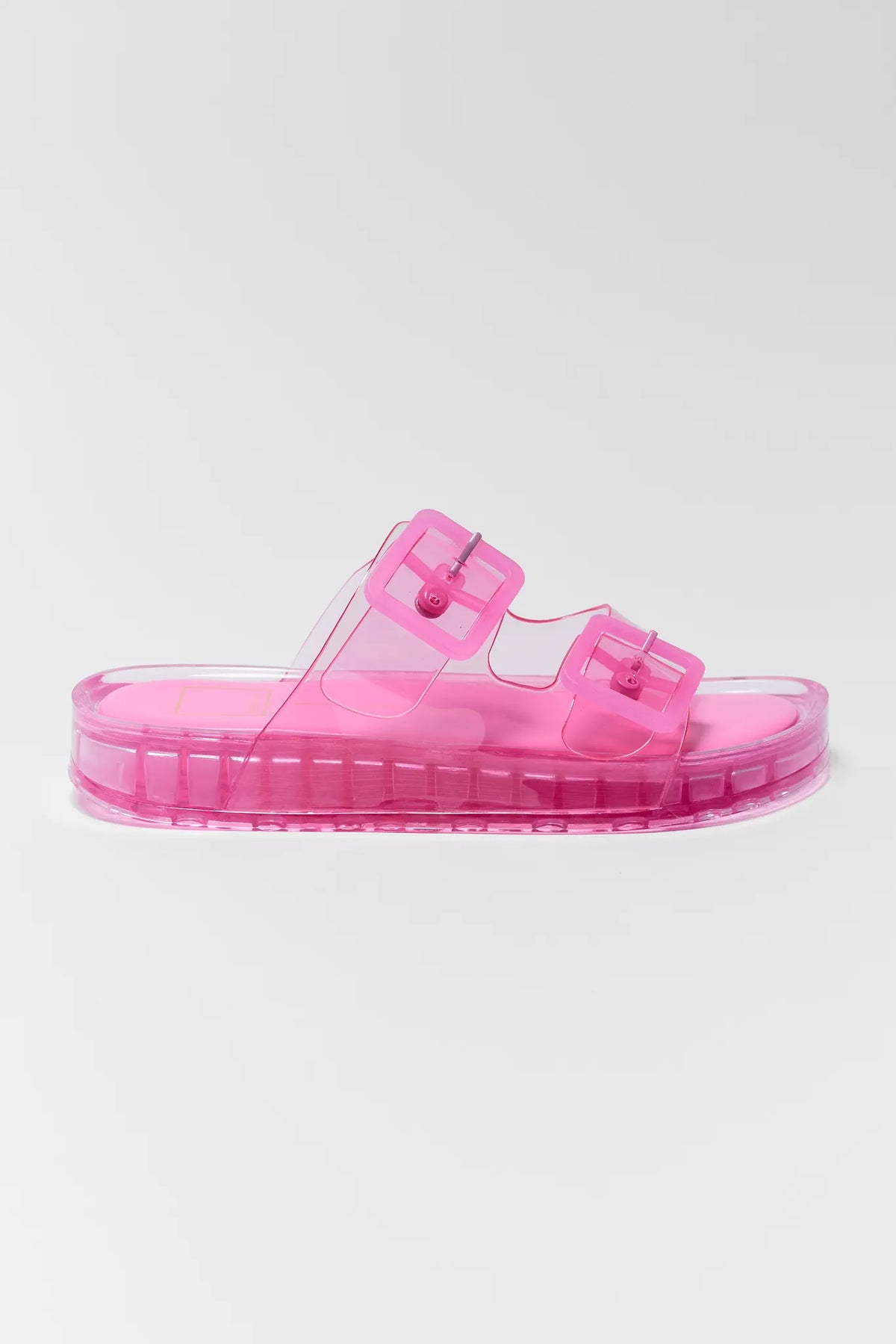 Dolce Vita Julio hot pink jelly sandals with double buckle straps and clear platform - Side Profile View | Avara
