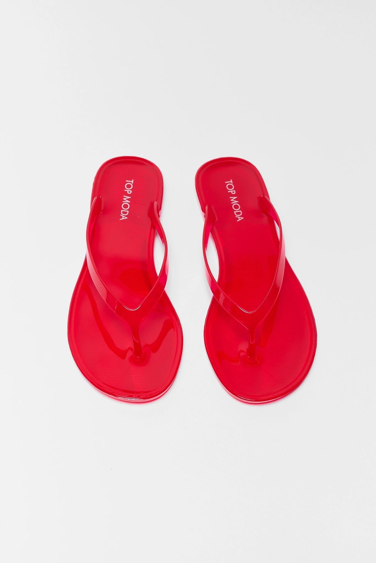 Red Jelly Sandals - Top-Down Flat Lay Pair View | Avara