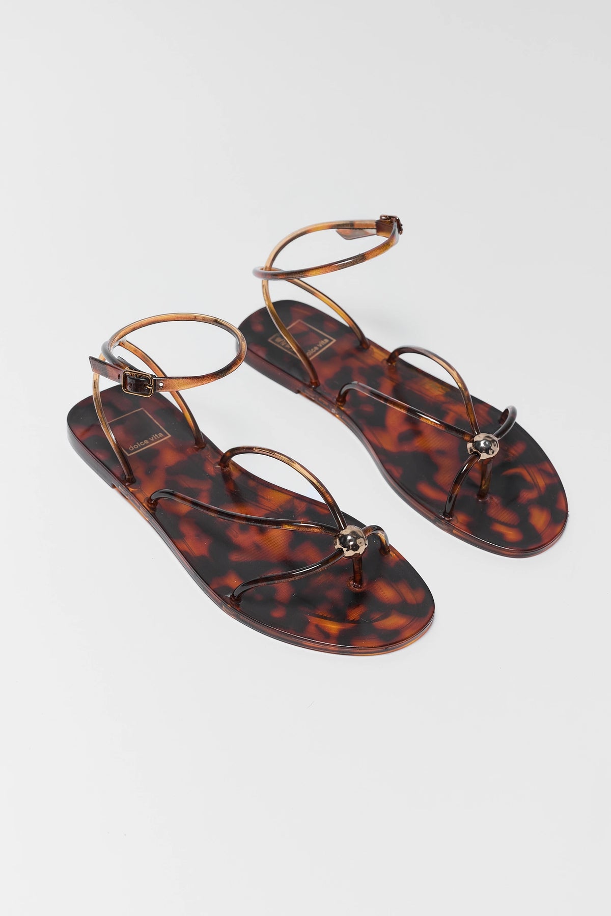 Dolce Vita Kenley tortoise shell sandals with ankle strap - Angled Flat Lay, Pair | Avara