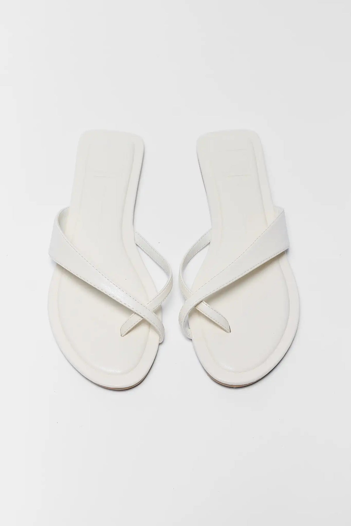 White Dolce Vita Lenex crossover sandals top-down flat lay view | Avara