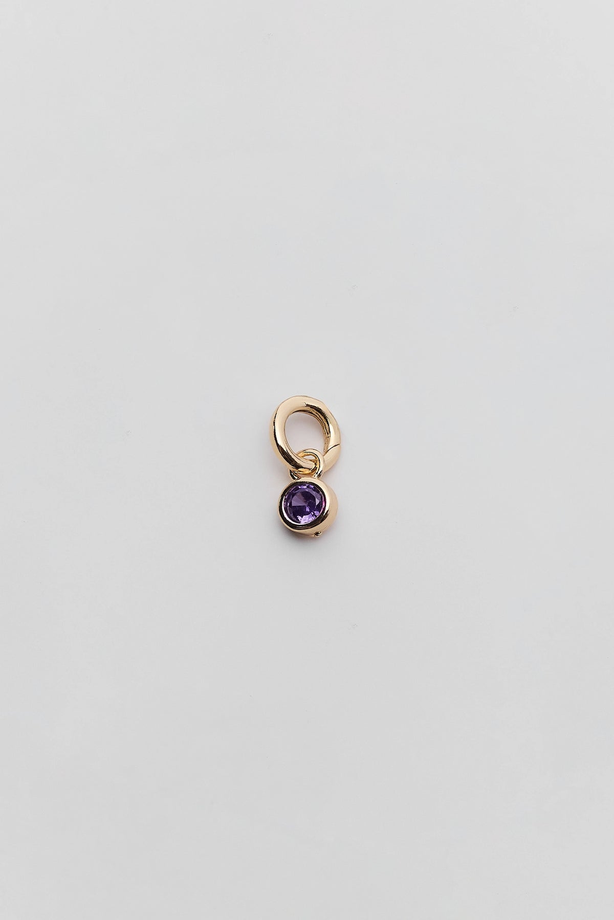 Purple rhinestone charm with gold clasp ring - Flat Lay, game day jewelry | Avara