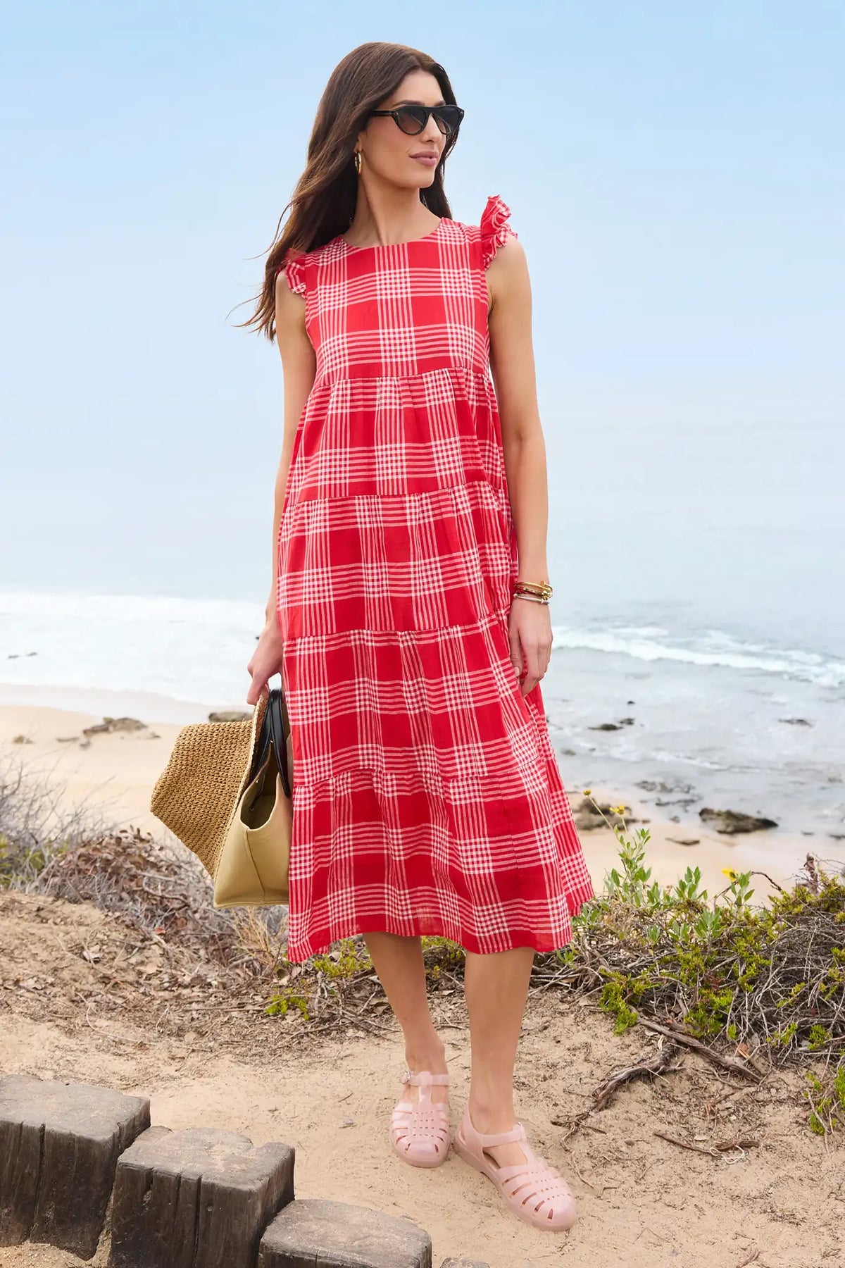 Red flutter sleeve midi dress styled at the beach, summer vacation look | Avara