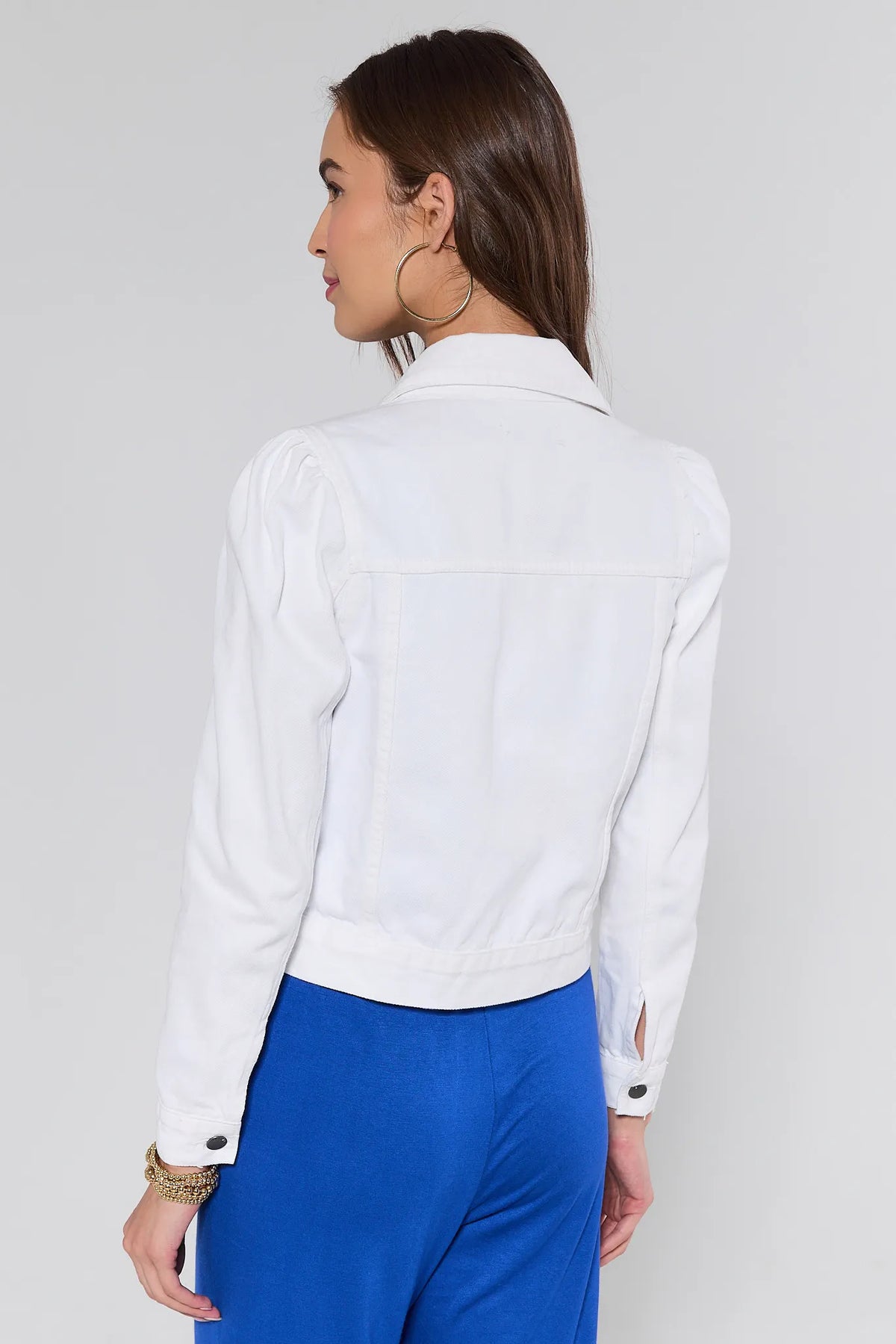 Roxanna White Denim Jacket back view showing puff sleeve silhouette and cropped fit over blue wide-leg pants | Avara