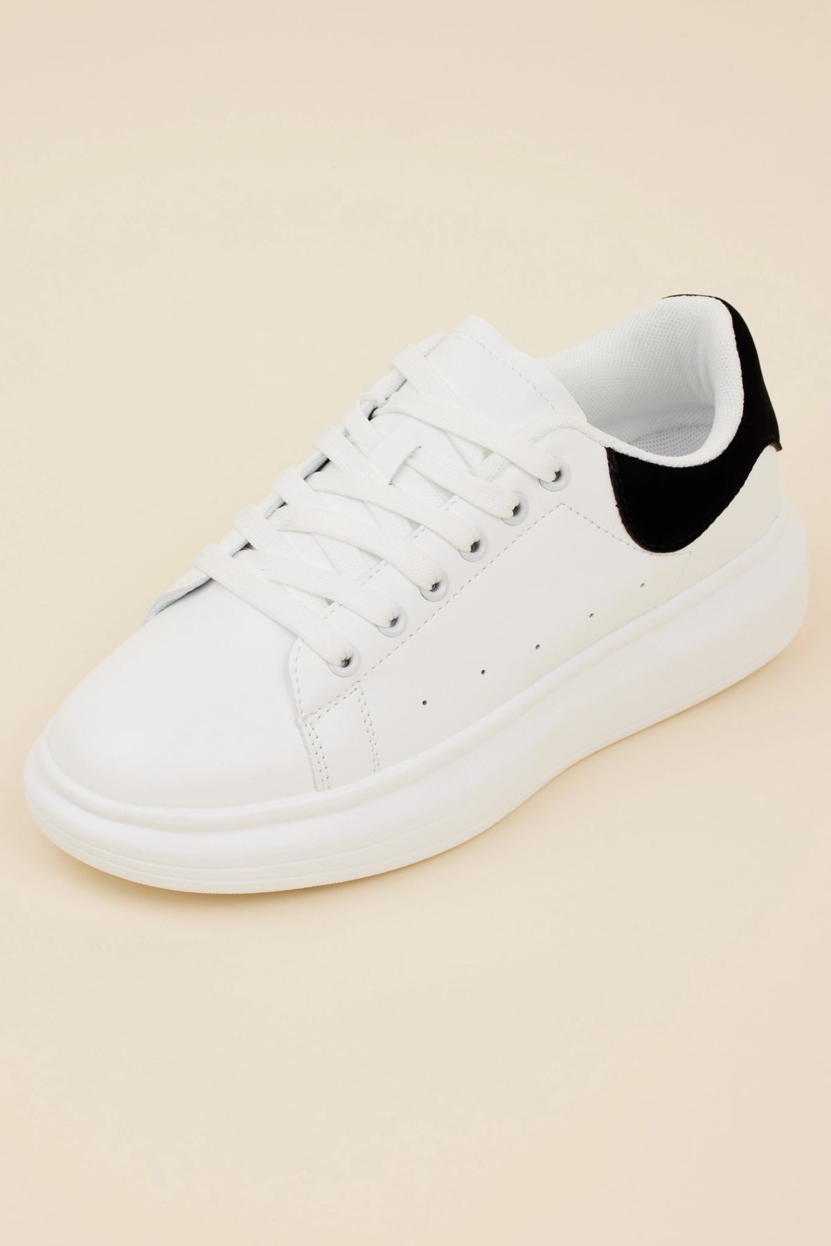 Georgie White Faux Leather Platform Sneakers, low-top with black suede heel tab, lace-up style - Front Angle | Avara