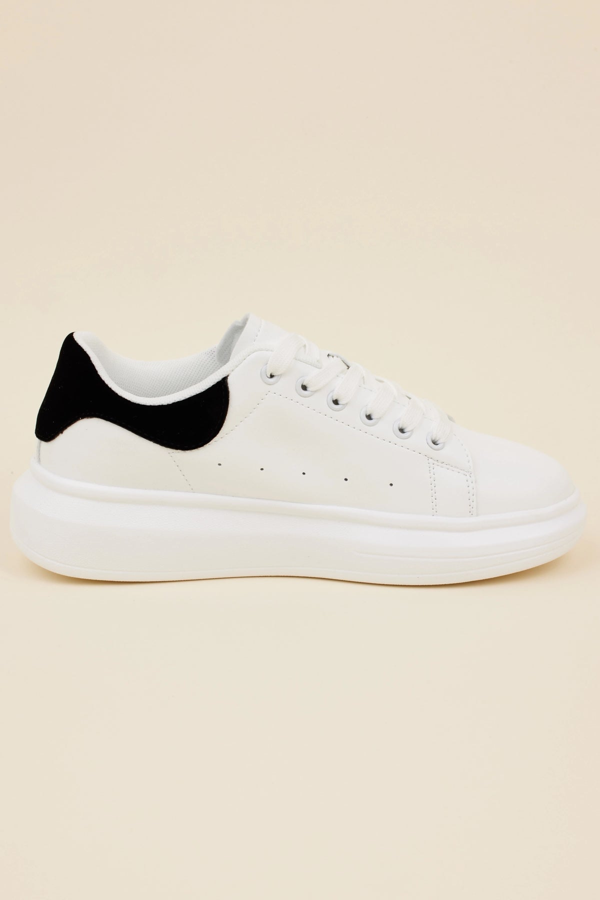 Georgie White Faux Leather Platform Sneakers showing black suede heel tab and thick rubber sole - Back View | Avara