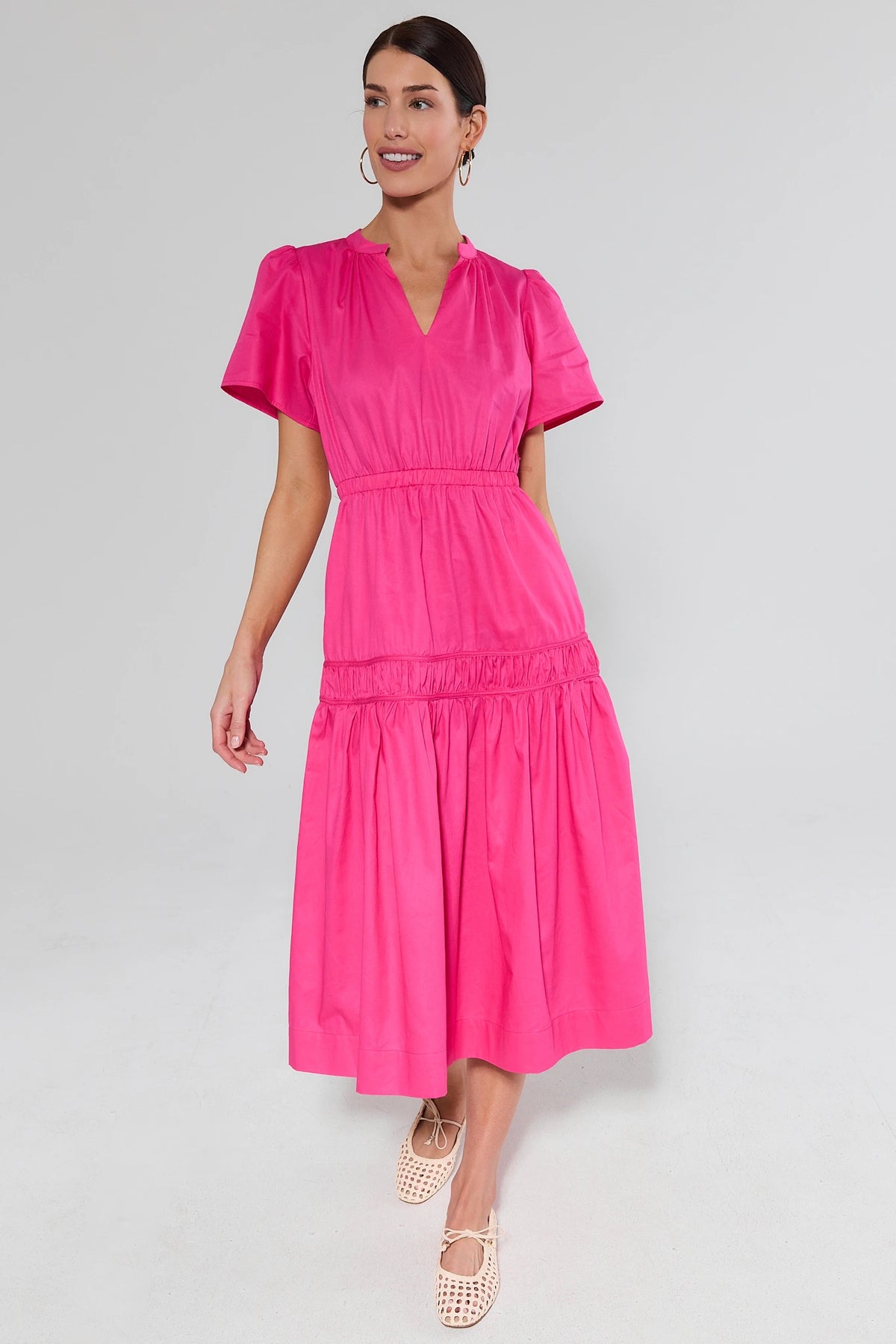 Valerie Pink Smocked Midi Dress - Front View, On Model with Flats | Avara