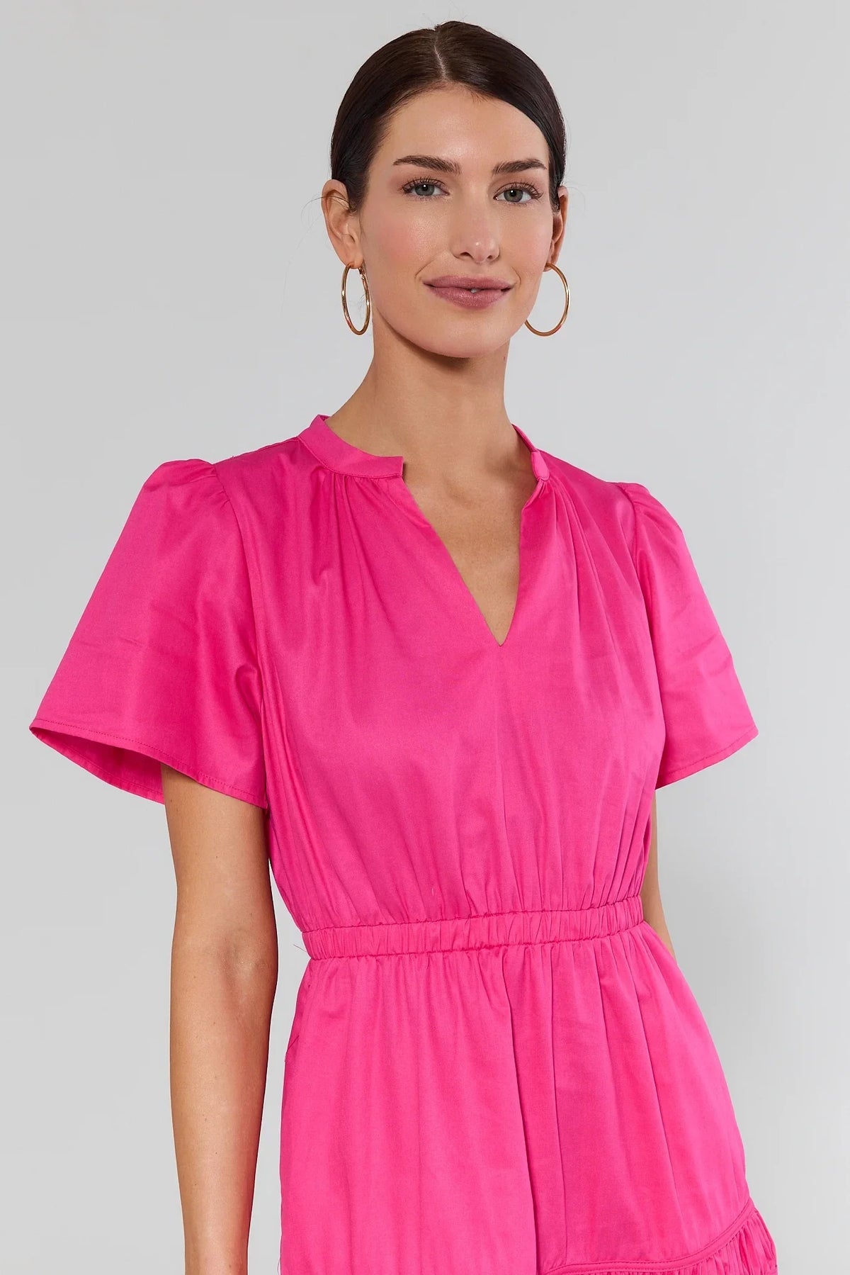 Valerie Pink Smocked Midi Dress - Close-Up of Band Collar V-Neckline & Short Sleeves | Avara
