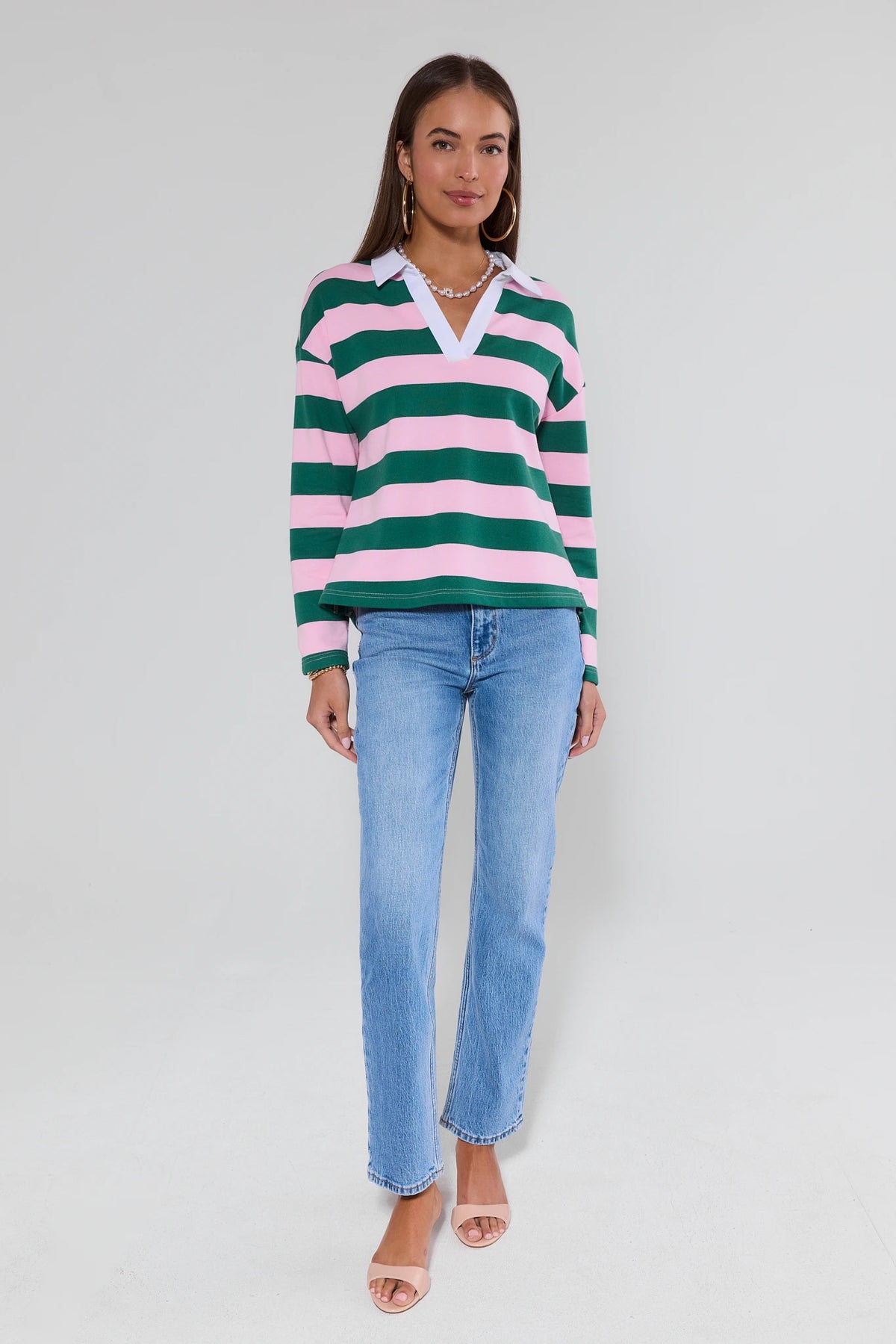 Lou Light Wash Straight Leg Jeans by Rolla's styled with pink-green striped rugby top and nude heels | Avara