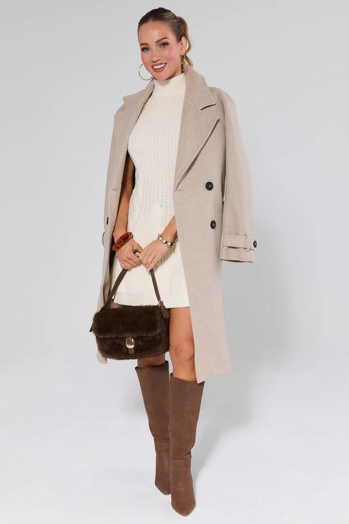 Mila Ivory Knit Sweater Dress Styled with Tan Trench Coat & Brown Boots | Avara