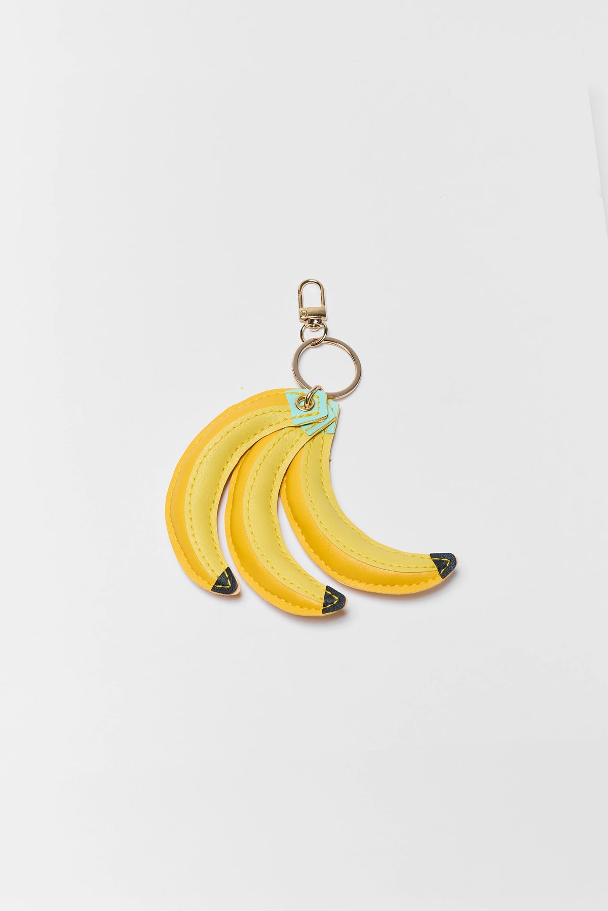 Yellow Faux Leather Banana Purse Charm with Gold-Tone Clip - Flat Lay | Avara