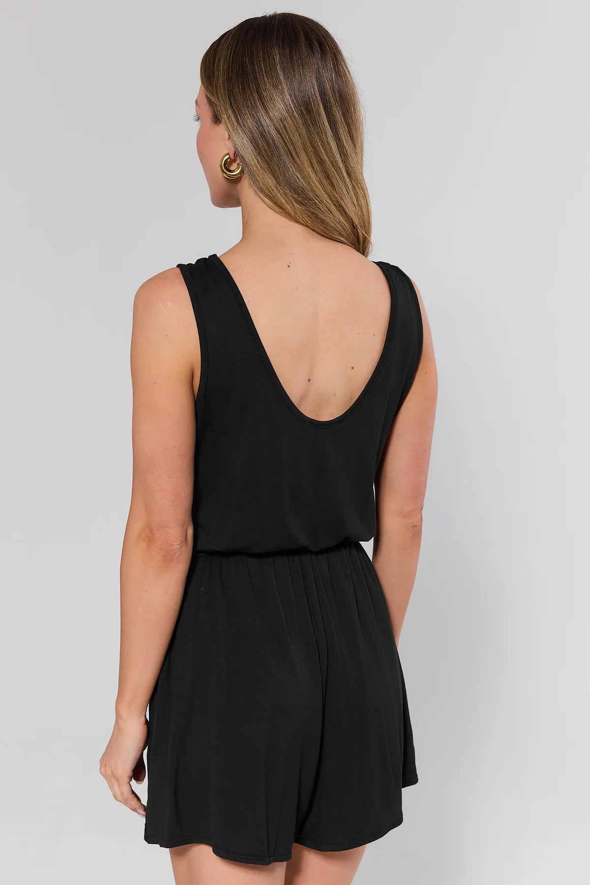 Heidi Black Drawstring Romper - Back View, Open Scoop Back Detail | Avara