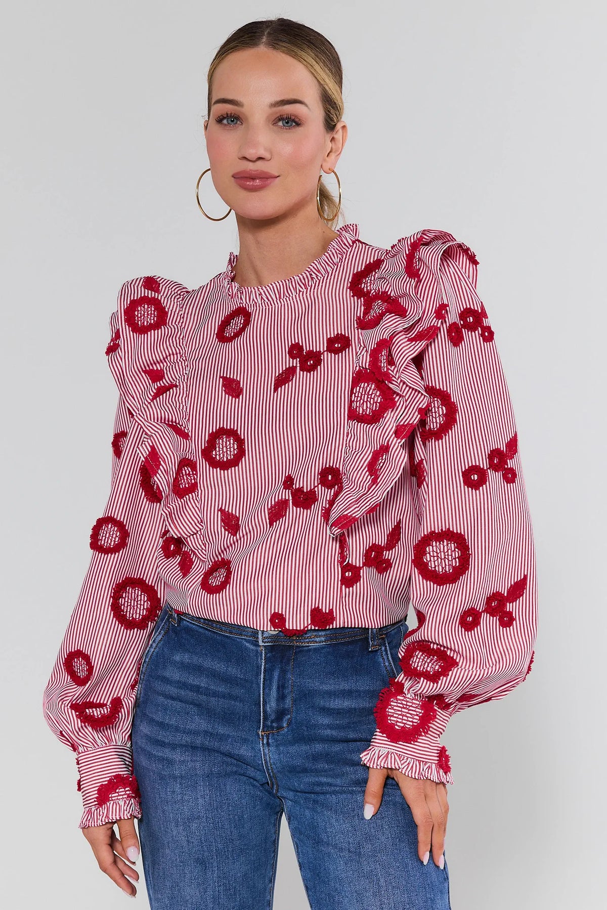 Rosie Red Floral Ruffle Top styled with blue jeans - Full Front View On Model | Avara
