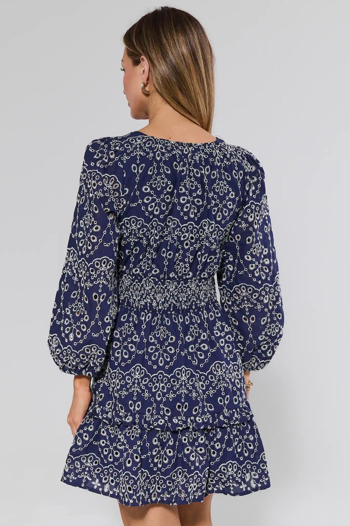Emmie Navy Embroidered Short Dress - Back View, Long Sleeve Modest Dress with Tiered Ruffle Hem | Avara