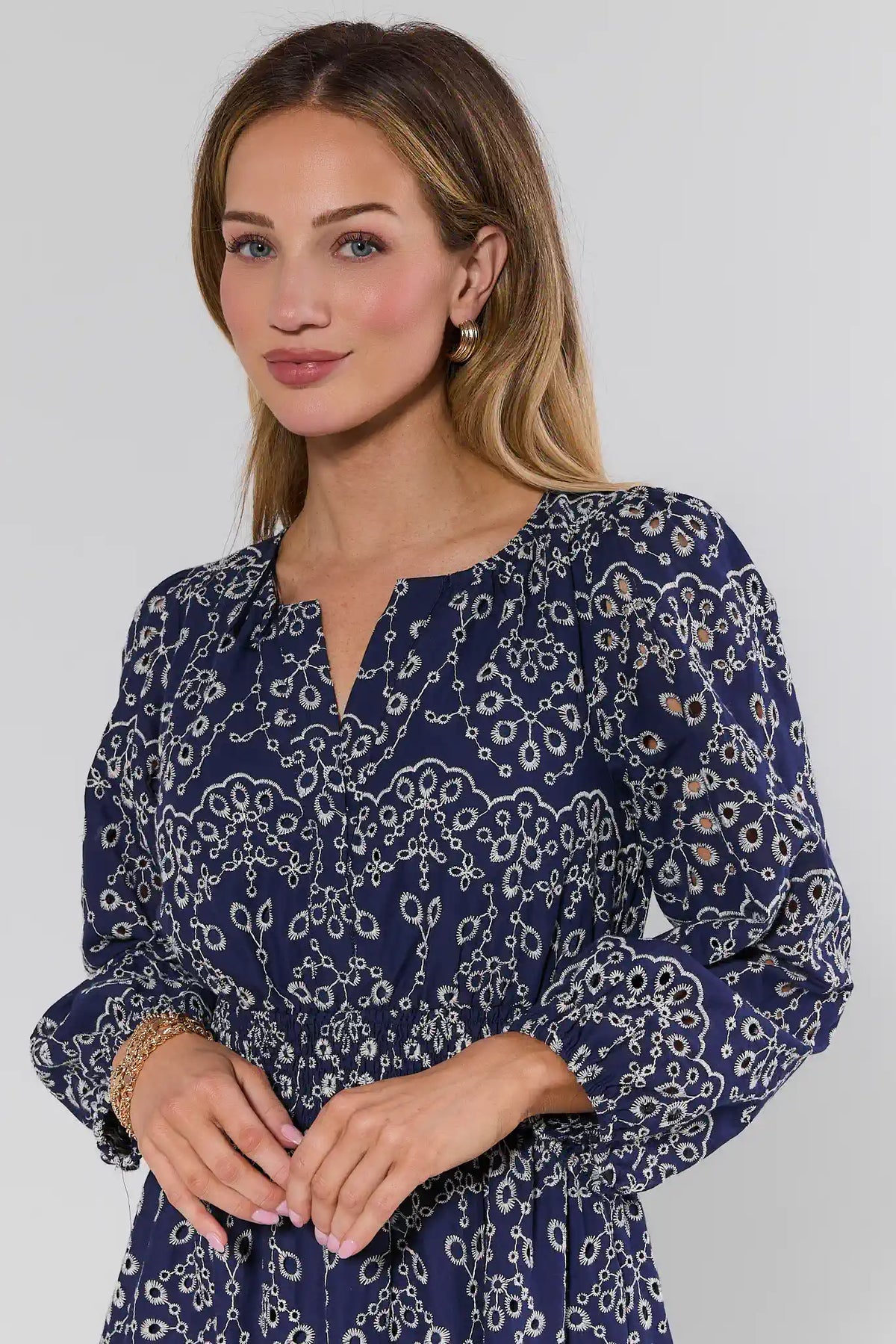 Emmie Navy Embroidered Short Dress - Close-Up Detail, Split Neckline & Eyelet Overlay | Avara