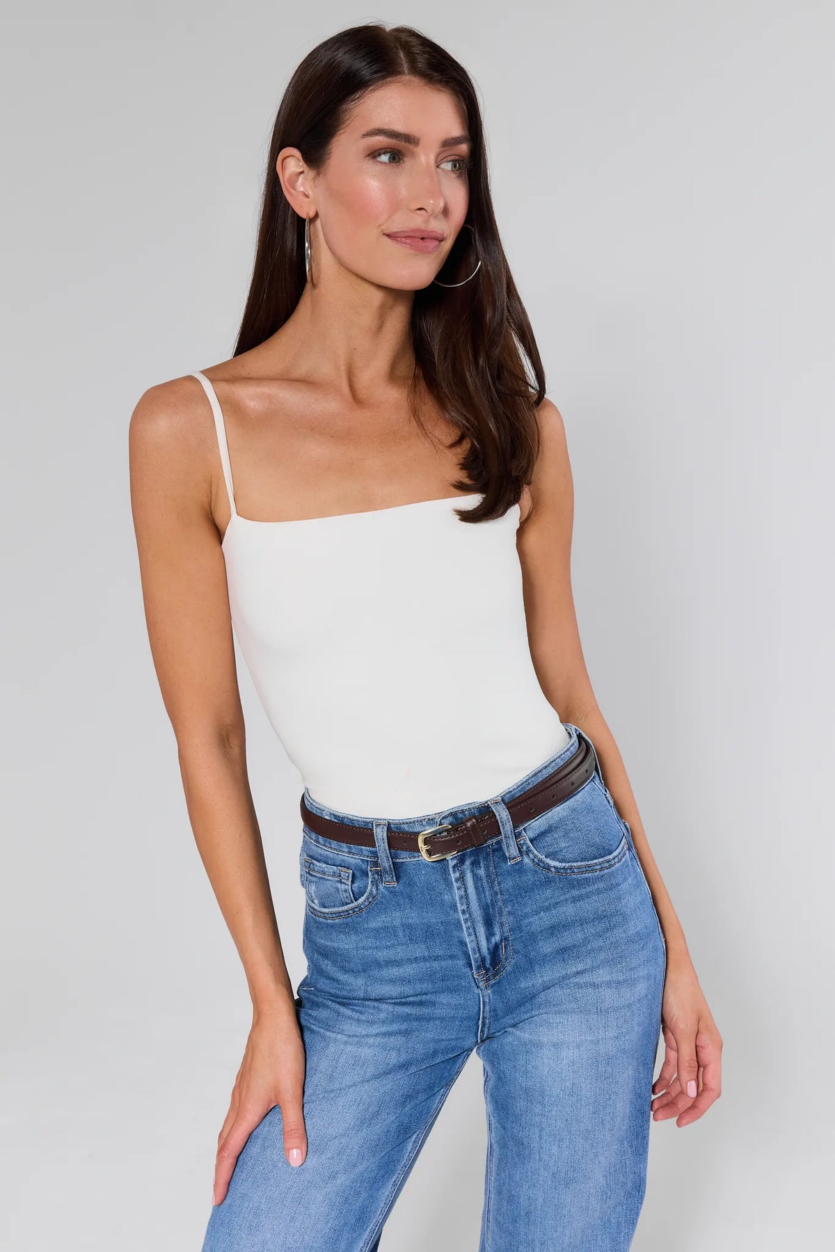 Aubrey Brown Buckle Belt on Model with White Top and Blue Jeans - Styled Look | Avara