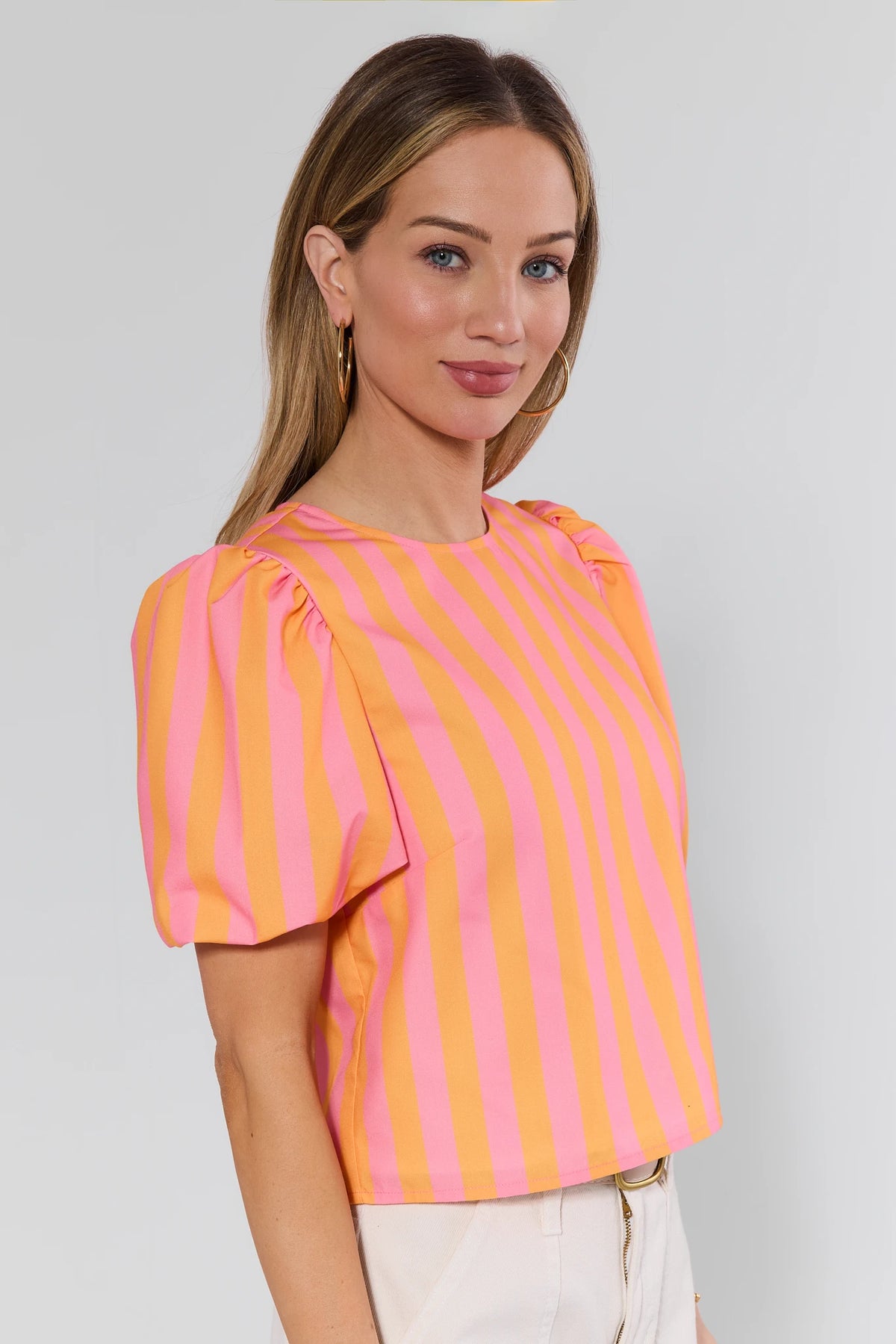 Marney Pink Orange Striped Puff Sleeve Top - Side Profile On Model | Avara