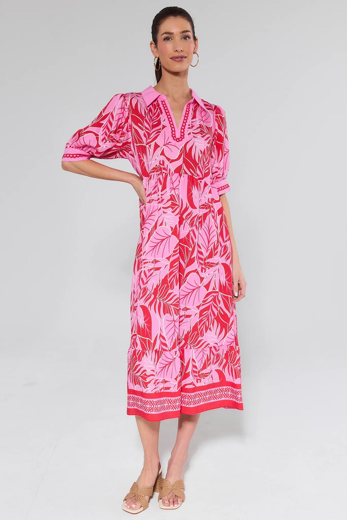 Gale Pink Printed Midi Dress with red and pink tropical leaf print, tiered skirt, and border hem - Front View | Avara