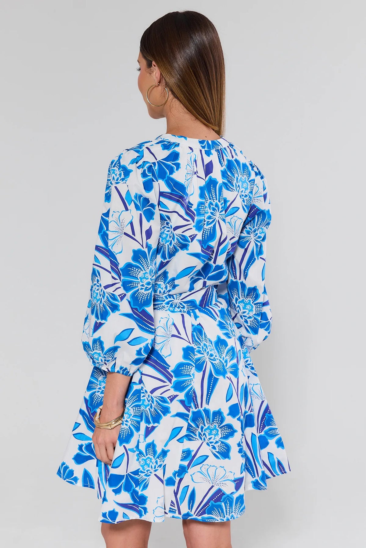 Augusta Blue Floral Mini Dress back view with elastic cuff sleeves and A-line skirt | Avara