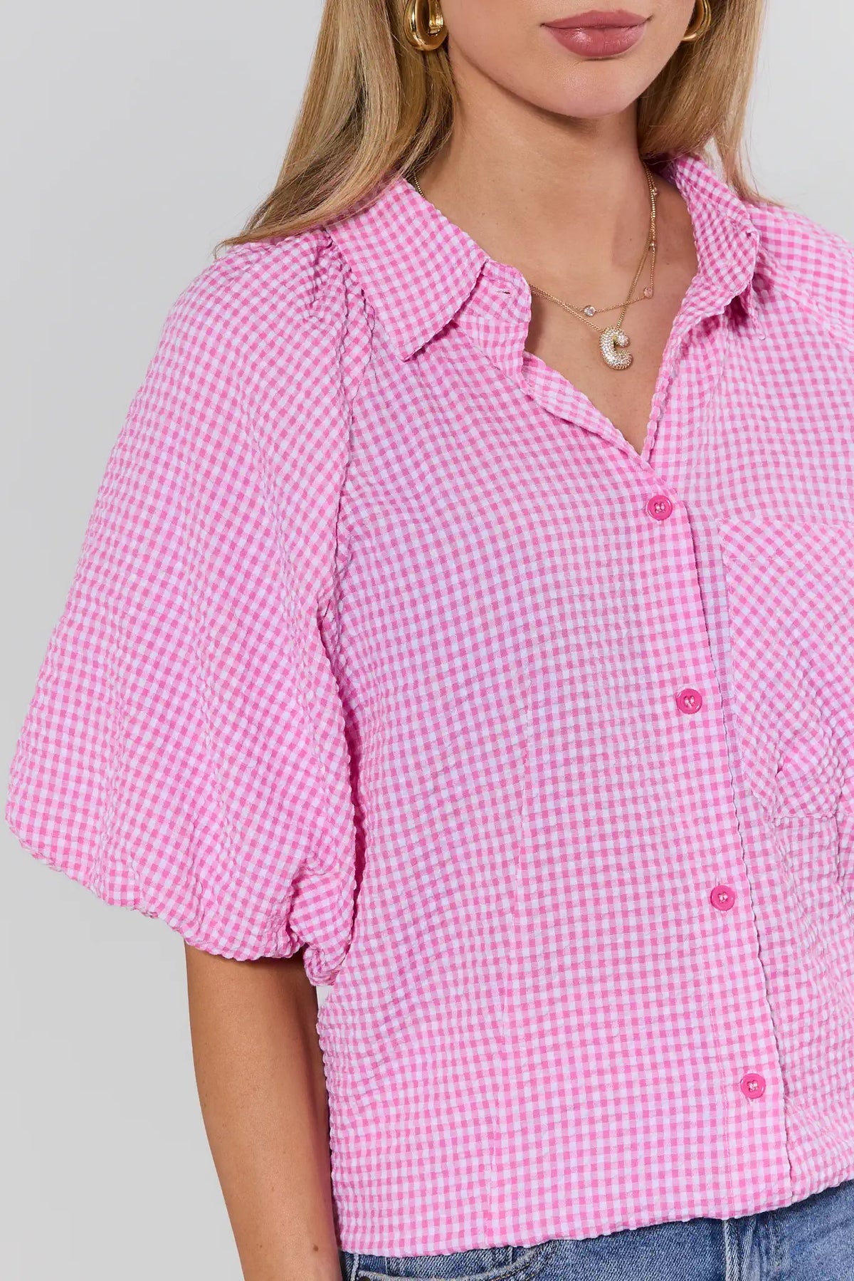 Ashton Pink Gingham Short Sleeve Top button-front and puff sleeve close-up detail | Avara