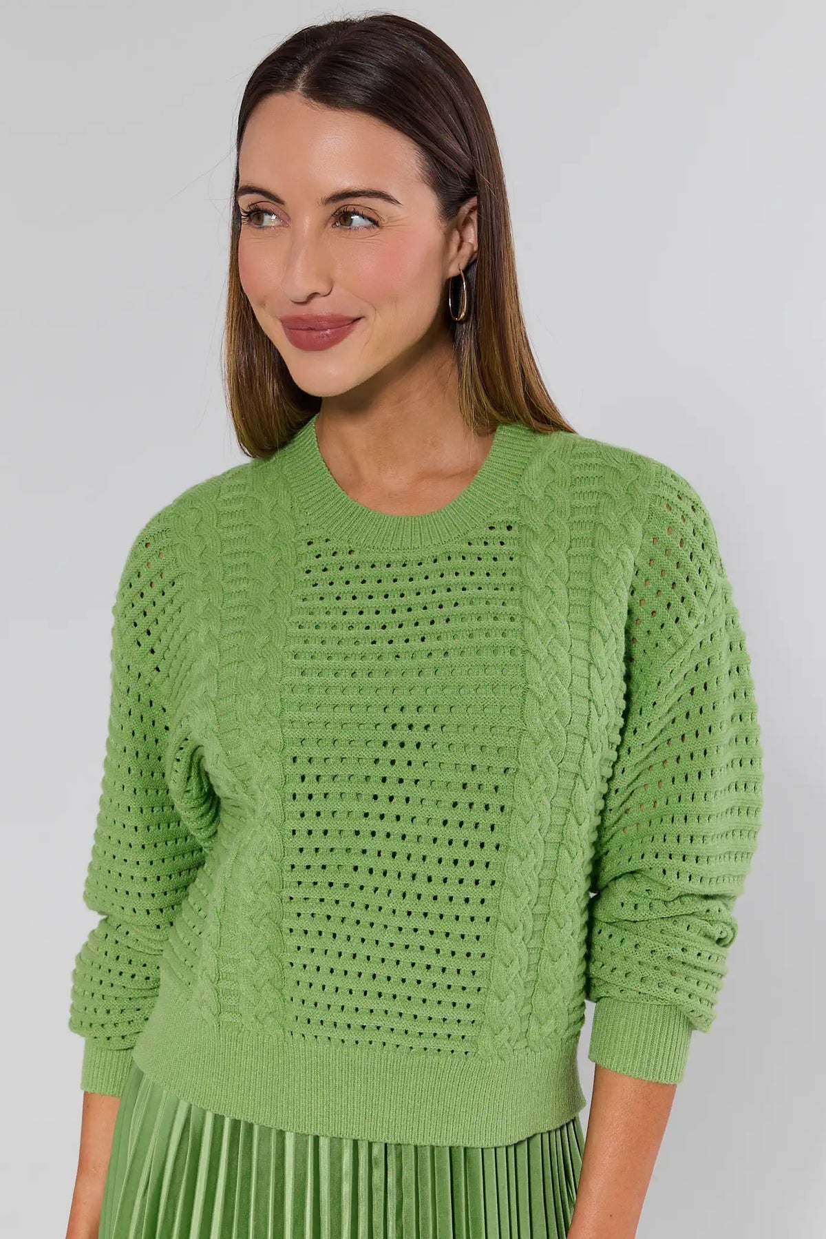 Green cable-knit sweater close-up detail, open-stitch texture and ribbed hem, modest midi dress set | Avara