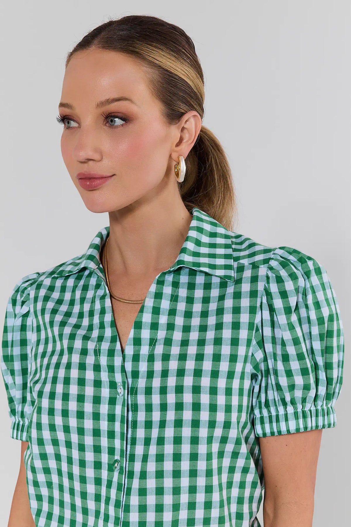Green and white gingham blouse with puff sleeves - collar and button detail close-up | Avara
