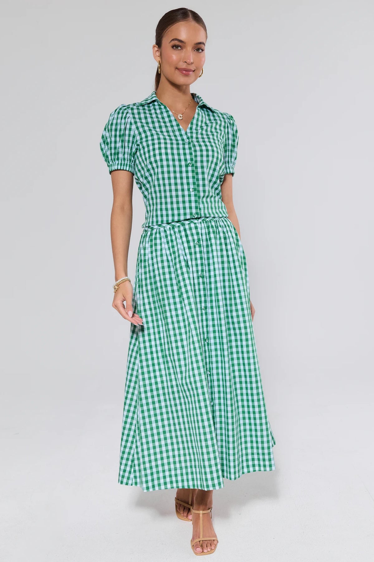 Green gingham midi skirt styled with matching top, A-line silhouette, on model - Front View | Avara