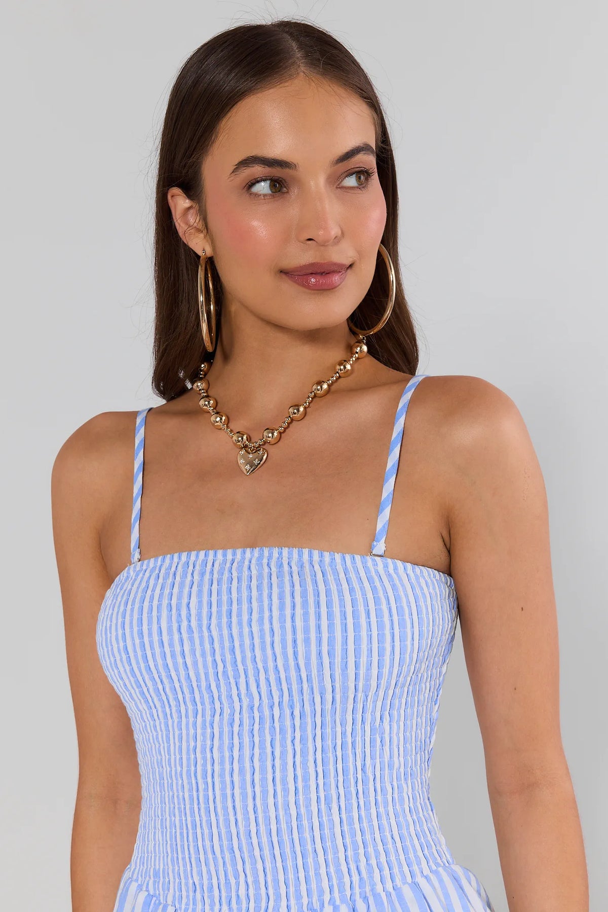 Cecilia Blue Striped Midi Dress with removable straps and smocked bodice - Close-Up Detail | Avara