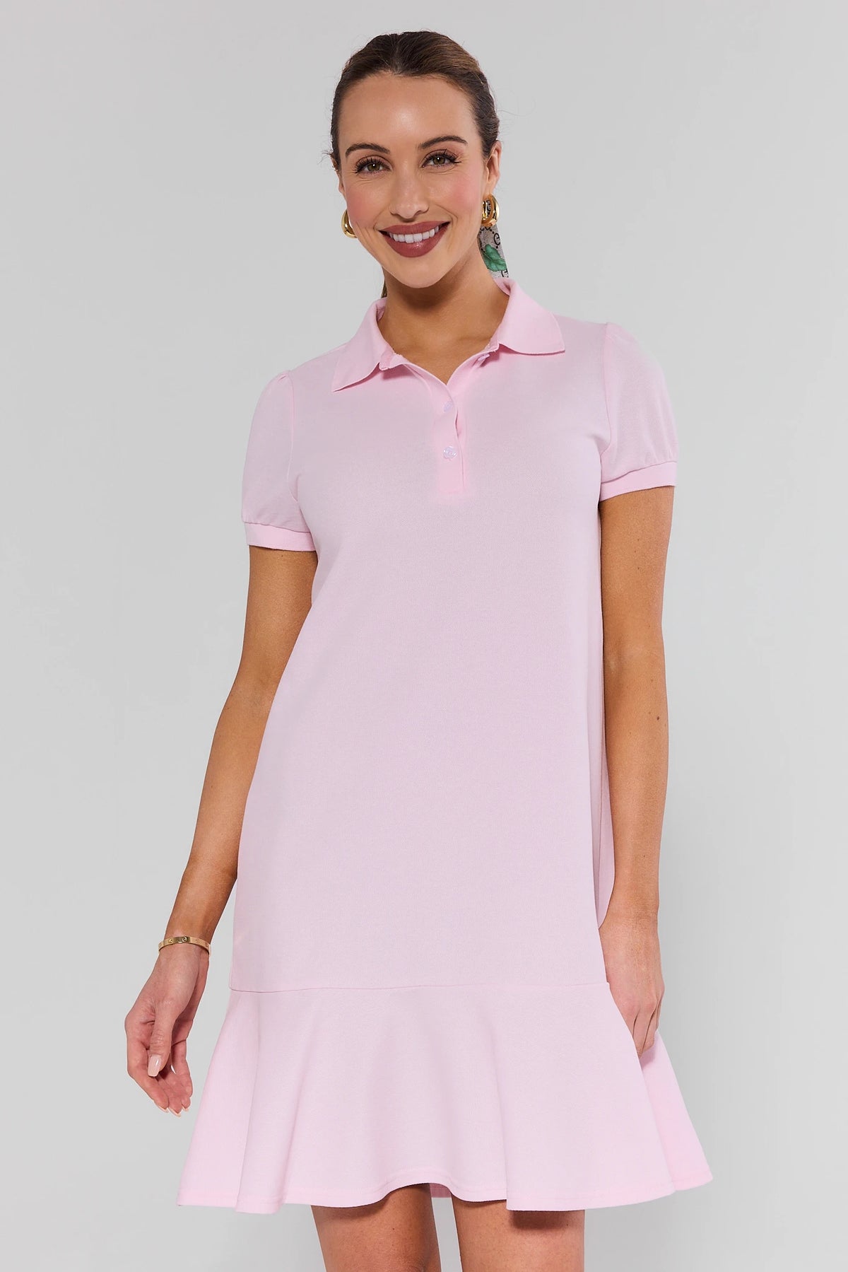 Light Pink Emerson Drop Waist Dress with polo collar and ruffle hem - Front View On Model | Avara