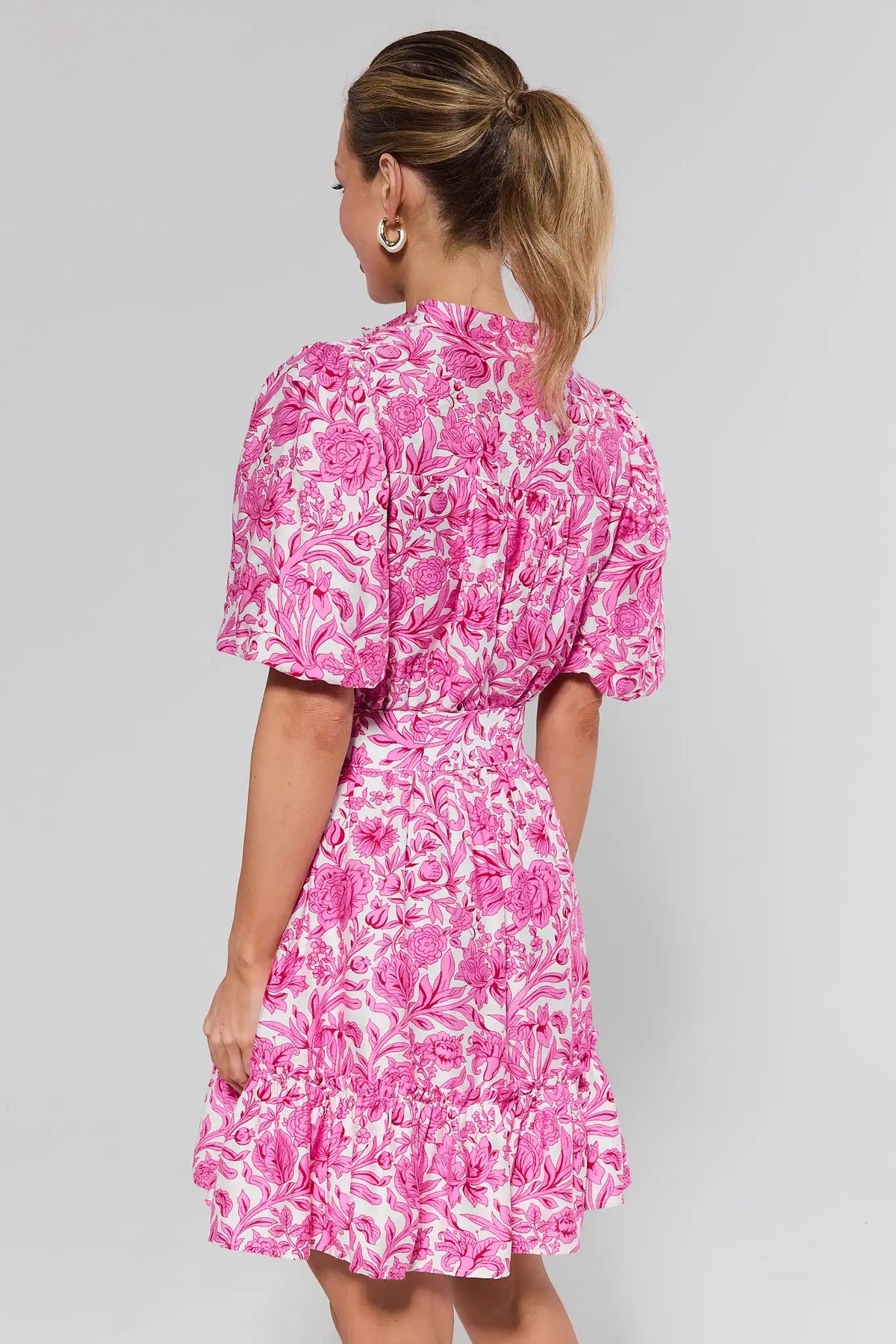Sloane Pink Floral Short Dress - Back View, smocked waist and tiered ruffle hem | Avara