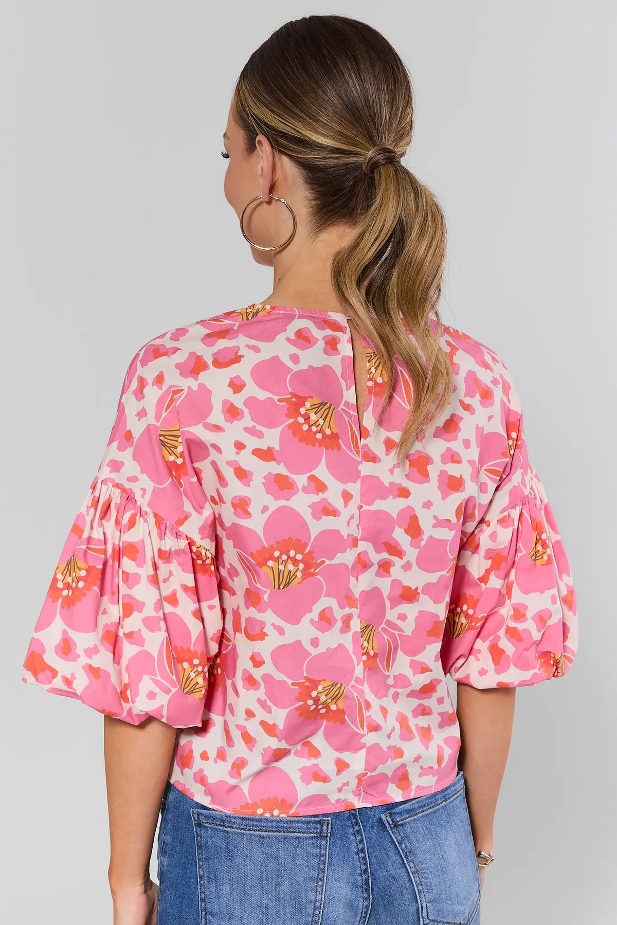 Peyton Pink Floral Print Top back view showing relaxed fit, puff sleeves, and keyhole detail | Avara