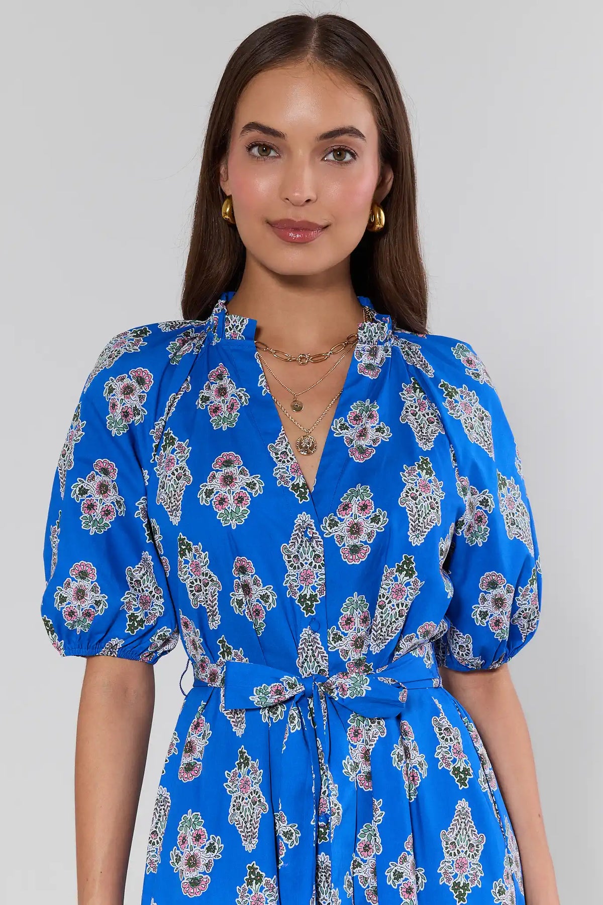 Anita Blue Floral Print Midi Dress, V-neckline and puff sleeves, close-up front view | Avara