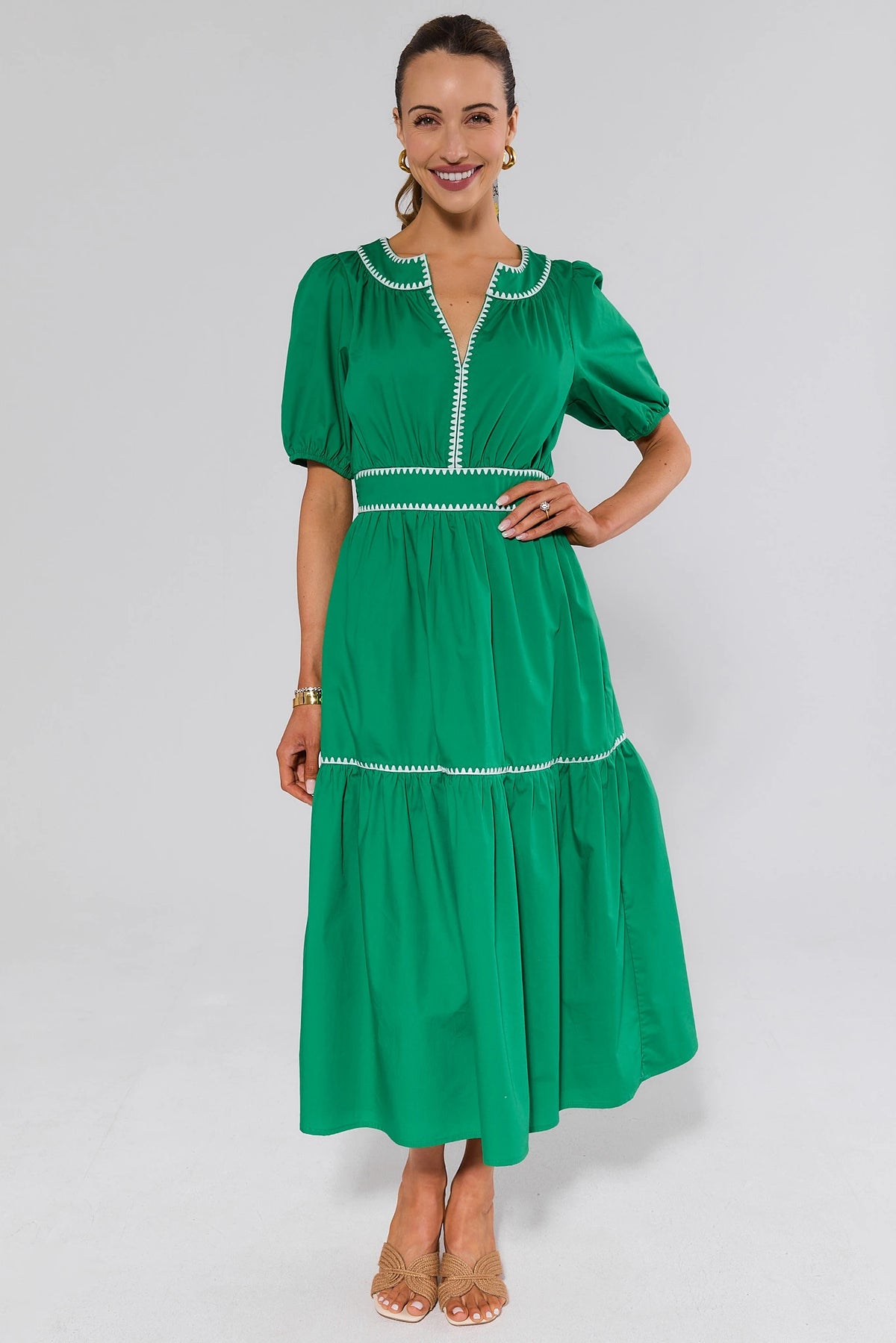 Green modest midi dress with white contrast trim and tiered skirt - Full Front View | Avara