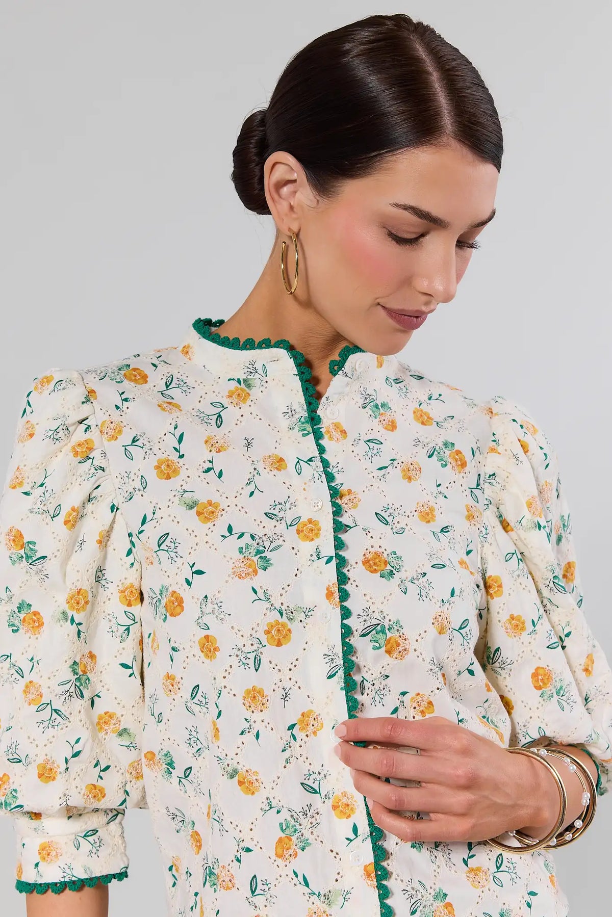 Cece Ivory Floral Eyelet Top green scallop trim neckline close-up detail - On Model | Avara